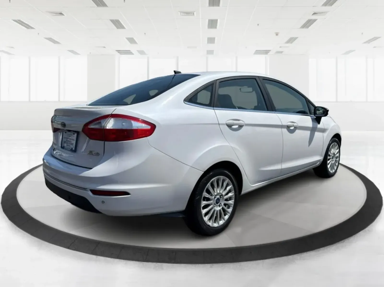 2016 Ford Fiesta Titanium (3FADP4CJ9GM) with an 1.6L I-4 DOHC engine, located at 880 E. National Road, Vandalia, OH, 45377, (937) 908-9800, 39.891918, -84.183594 - **Experience the Ultimate in Style and Comfort with the 2016 Ford Fiesta Titanium Sedan!**<br /> <br /> Are you looking for a stylish yet practical vehicle that fits seamlessly into your daily life? The 2016 Ford Fiesta Titanium Sedan is designed for those who crave sophistication without sacrificin - Photo#2