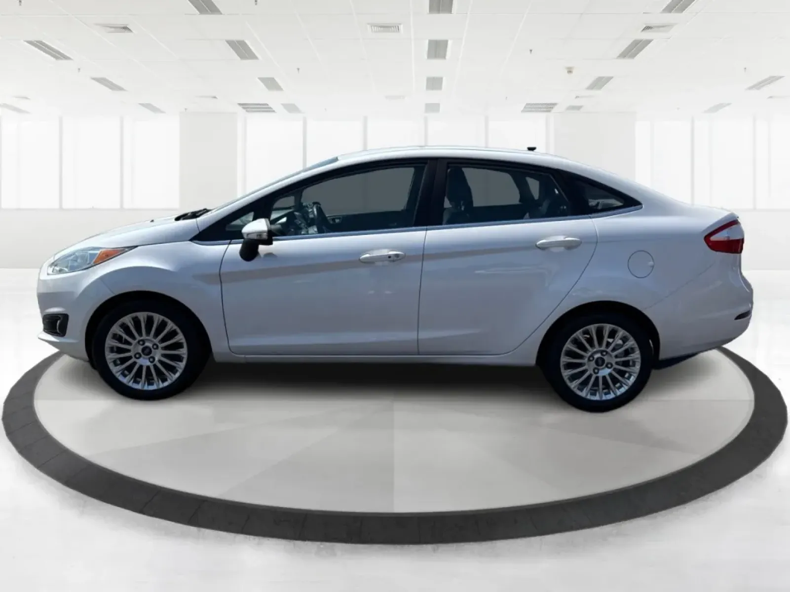 2016 Ford Fiesta Titanium (3FADP4CJ9GM) with an 1.6L I-4 DOHC engine, located at 880 E. National Road, Vandalia, OH, 45377, (937) 908-9800, 39.891918, -84.183594 - **Experience the Ultimate in Style and Comfort with the 2016 Ford Fiesta Titanium Sedan!**<br /> <br /> Are you looking for a stylish yet practical vehicle that fits seamlessly into your daily life? The 2016 Ford Fiesta Titanium Sedan is designed for those who crave sophistication without sacrificin - Photo#5
