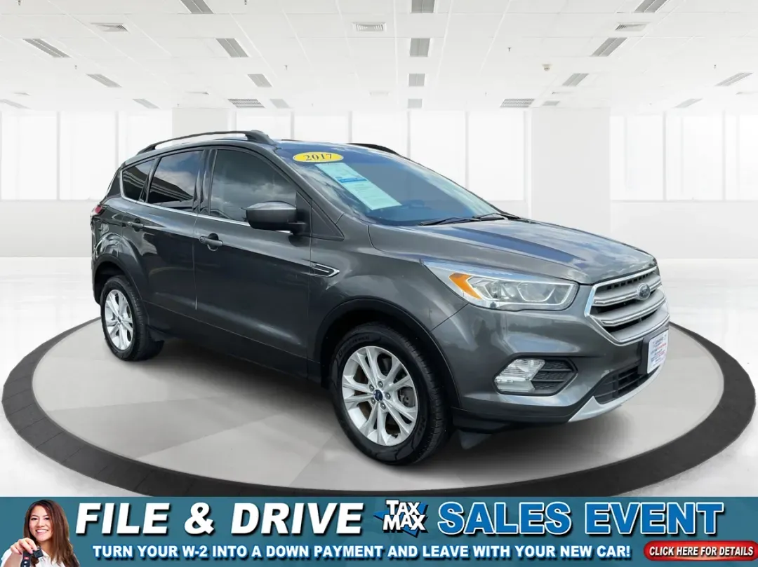 2017 Ford Escape SE (1FMCU9GD7HU) with an 1.5L L4 DOHC 16V engine, 6A transmission, located at 1099 N County Rd 25A , Troy, OH, 45373, (937) 908-9800, 40.057079, -84.212883 - **Adventure Awaits With This 2017 Ford Escape SE! Perfect for Your Next Journey!**<br /> <br /> Are you ready to elevate your weekend getaways or daily commutes? The 2017 Ford Escape SE is the ideal SUV for those who crave versatility without sacrificing style. With a spacious interior, advanced saf - Photo#0