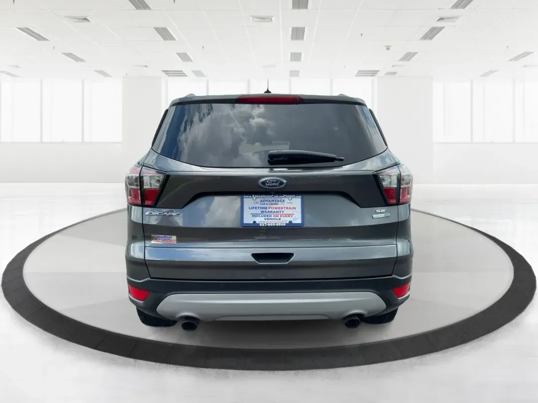 2017 Ford Escape SE (1FMCU9GD7HU) with an 1.5L L4 DOHC 16V engine, 6A transmission, located at 1099 N County Rd 25A , Troy, OH, 45373, (937) 908-9800, 40.057079, -84.212883 - **Adventure Awaits With This 2017 Ford Escape SE! Perfect for Your Next Journey!**<br /> <br /> Are you ready to elevate your weekend getaways or daily commutes? The 2017 Ford Escape SE is the ideal SUV for those who crave versatility without sacrificing style. With a spacious interior, advanced saf - Photo#3