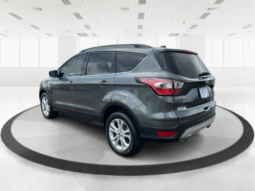 2017 Ford Escape SE (1FMCU9GD7HU) with an 1.5L L4 DOHC 16V engine, 6A transmission, located at 1099 N County Rd 25A , Troy, OH, 45373, (937) 908-9800, 40.057079, -84.212883 - **Adventure Awaits With This 2017 Ford Escape SE! Perfect for Your Next Journey!**<br /> <br /> Are you ready to elevate your weekend getaways or daily commutes? The 2017 Ford Escape SE is the ideal SUV for those who crave versatility without sacrificing style. With a spacious interior, advanced saf - Photo#4