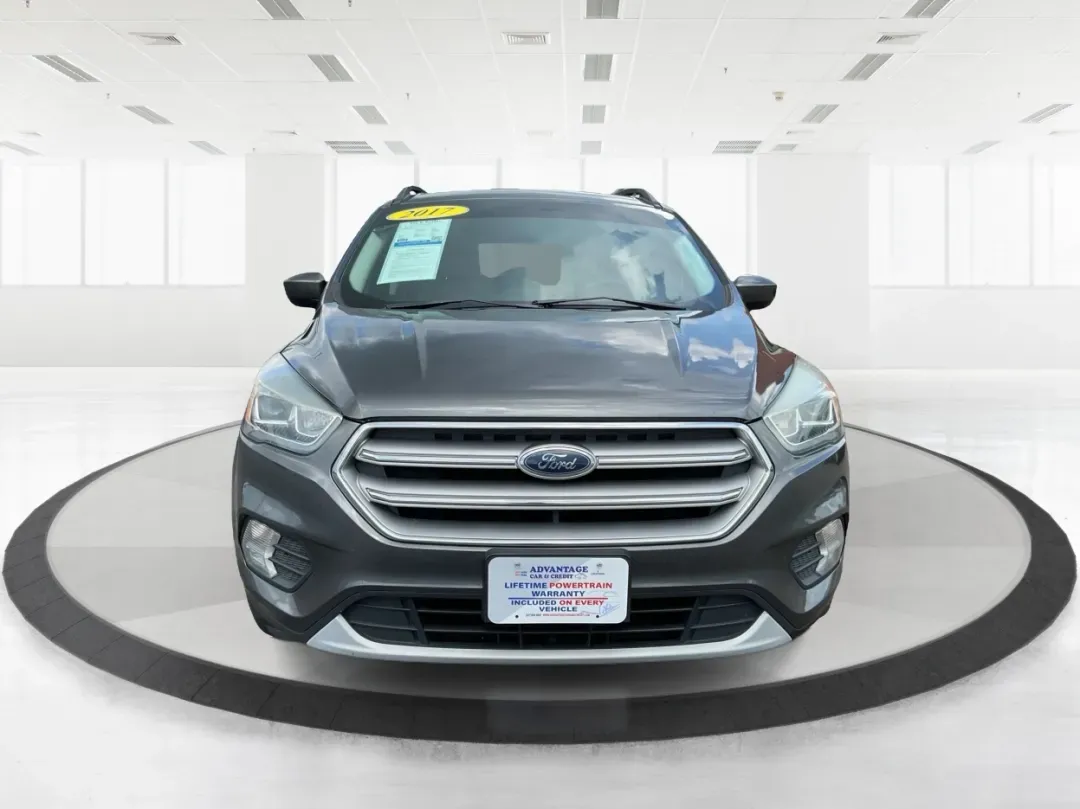 2017 Ford Escape SE (1FMCU9GD7HU) with an 1.5L L4 DOHC 16V engine, 6A transmission, located at 1099 N County Rd 25A , Troy, OH, 45373, (937) 908-9800, 40.057079, -84.212883 - **Adventure Awaits With This 2017 Ford Escape SE! Perfect for Your Next Journey!**<br /> <br /> Are you ready to elevate your weekend getaways or daily commutes? The 2017 Ford Escape SE is the ideal SUV for those who crave versatility without sacrificing style. With a spacious interior, advanced saf - Photo#7