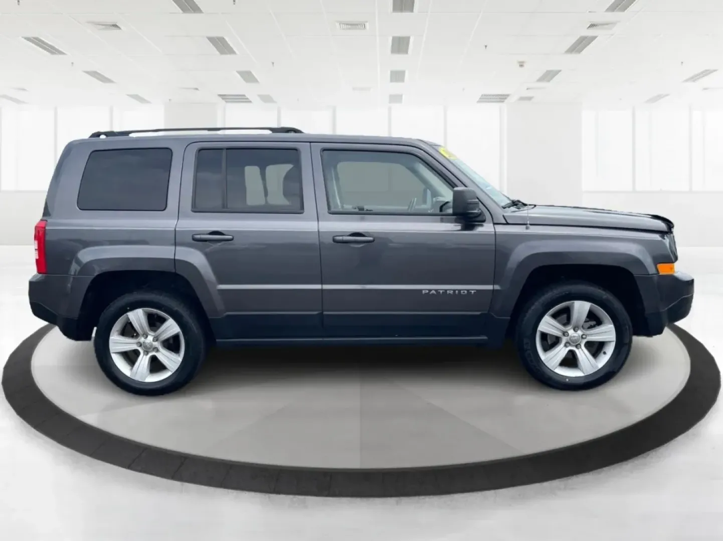 2014 Jeep Patriot Latitude 4WD (1C4NJRFB5ED) with an 2.4L L4 DOHC 16V engine, located at 880 E. National Road, Vandalia, OH, 45377, (937) 908-9800, 39.891918, -84.183594 - **Adventure Awaits with the 2014 Jeep Patriot Latitude 4WD!**<br /> <br /> If you're longing for a vehicle that blends rugged capability with everyday comfort, look no further than the 2014 Jeep Patriot Latitude 4WD. Perfect for weekend adventures or daily commutes, this SUV is designed to take you - Photo#1