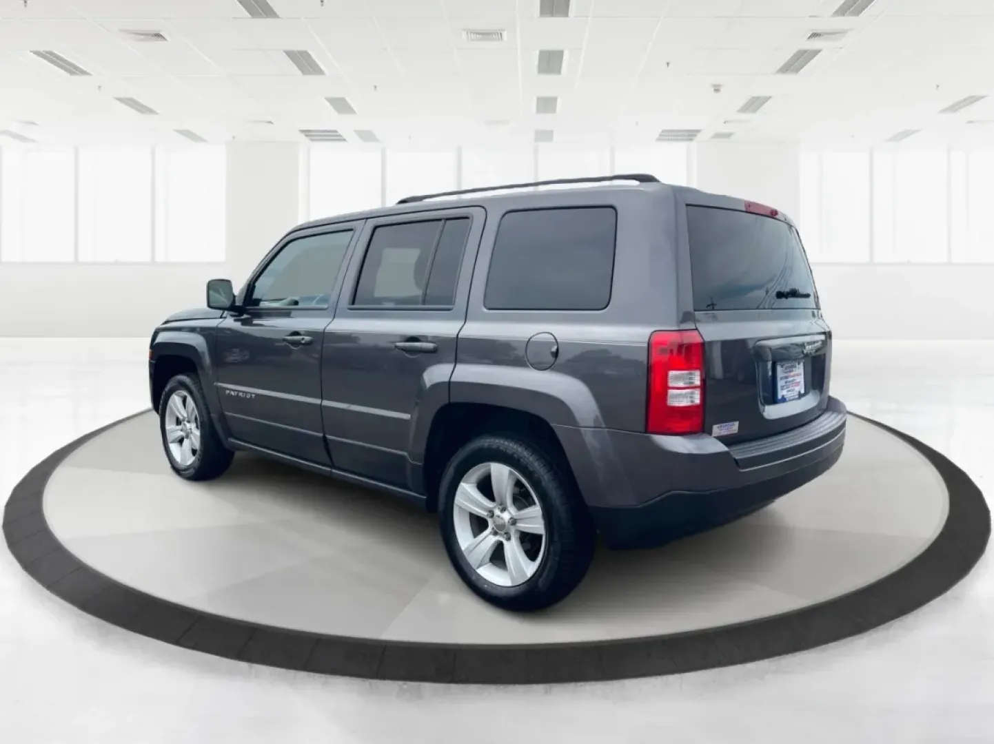 2014 Jeep Patriot Latitude 4WD (1C4NJRFB5ED) with an 2.4L L4 DOHC 16V engine, located at 880 E. National Road, Vandalia, OH, 45377, (937) 908-9800, 39.891918, -84.183594 - **Adventure Awaits with the 2014 Jeep Patriot Latitude 4WD!**<br /> <br /> If you're longing for a vehicle that blends rugged capability with everyday comfort, look no further than the 2014 Jeep Patriot Latitude 4WD. Perfect for weekend adventures or daily commutes, this SUV is designed to take you - Photo#4