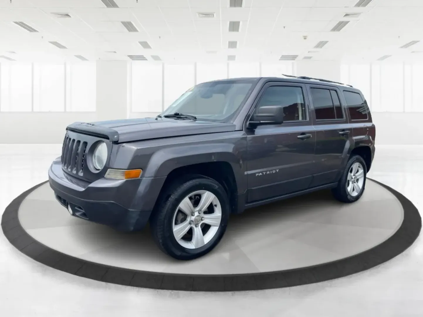 2014 Jeep Patriot Latitude 4WD (1C4NJRFB5ED) with an 2.4L L4 DOHC 16V engine, located at 880 E. National Road, Vandalia, OH, 45377, (937) 908-9800, 39.891918, -84.183594 - **Adventure Awaits with the 2014 Jeep Patriot Latitude 4WD!**<br /> <br /> If you're longing for a vehicle that blends rugged capability with everyday comfort, look no further than the 2014 Jeep Patriot Latitude 4WD. Perfect for weekend adventures or daily commutes, this SUV is designed to take you - Photo#8