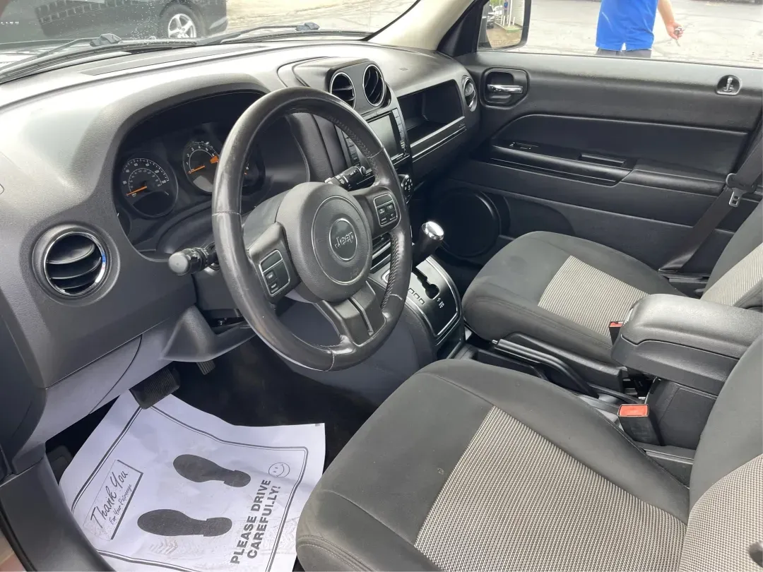 2014 Jeep Patriot Latitude 4WD (1C4NJRFB5ED) with an 2.4L L4 DOHC 16V engine, located at 1230 East Main St, Xenia, OH, 45385, (937) 908-9800, 39.688026, -83.910172 - **Adventure Awaits with the 2014 Jeep Patriot Latitude 4WD!**<br /> <br /> If you're longing for a vehicle that blends rugged capability with everyday comfort, look no further than the 2014 Jeep Patriot Latitude 4WD. Perfect for weekend adventures or daily commutes, this SUV is designed to take you - Photo#9