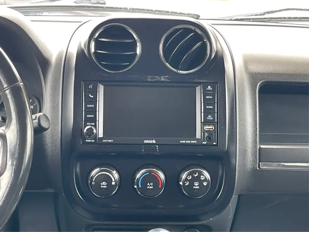 2014 Jeep Patriot Latitude 4WD (1C4NJRFB5ED) with an 2.4L L4 DOHC 16V engine, located at 1230 East Main St, Xenia, OH, 45385, (937) 908-9800, 39.688026, -83.910172 - **Adventure Awaits with the 2014 Jeep Patriot Latitude 4WD!**<br /> <br /> If you're longing for a vehicle that blends rugged capability with everyday comfort, look no further than the 2014 Jeep Patriot Latitude 4WD. Perfect for weekend adventures or daily commutes, this SUV is designed to take you - Photo#13