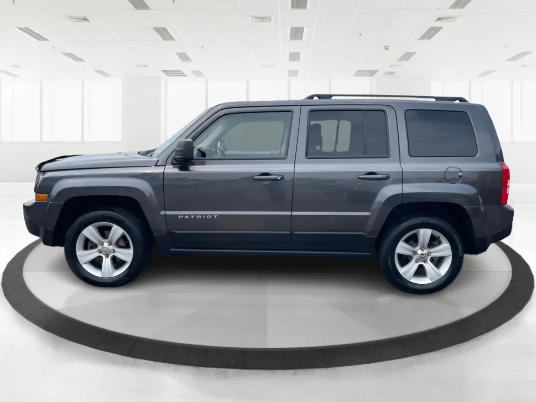 2014 Jeep Patriot Latitude 4WD (1C4NJRFB5ED) with an 2.4L L4 DOHC 16V engine, located at 1230 East Main St, Xenia, OH, 45385, (937) 908-9800, 39.688026, -83.910172 - **Adventure Awaits with the 2014 Jeep Patriot Latitude 4WD!**<br /> <br /> If you're longing for a vehicle that blends rugged capability with everyday comfort, look no further than the 2014 Jeep Patriot Latitude 4WD. Perfect for weekend adventures or daily commutes, this SUV is designed to take you - Photo#5