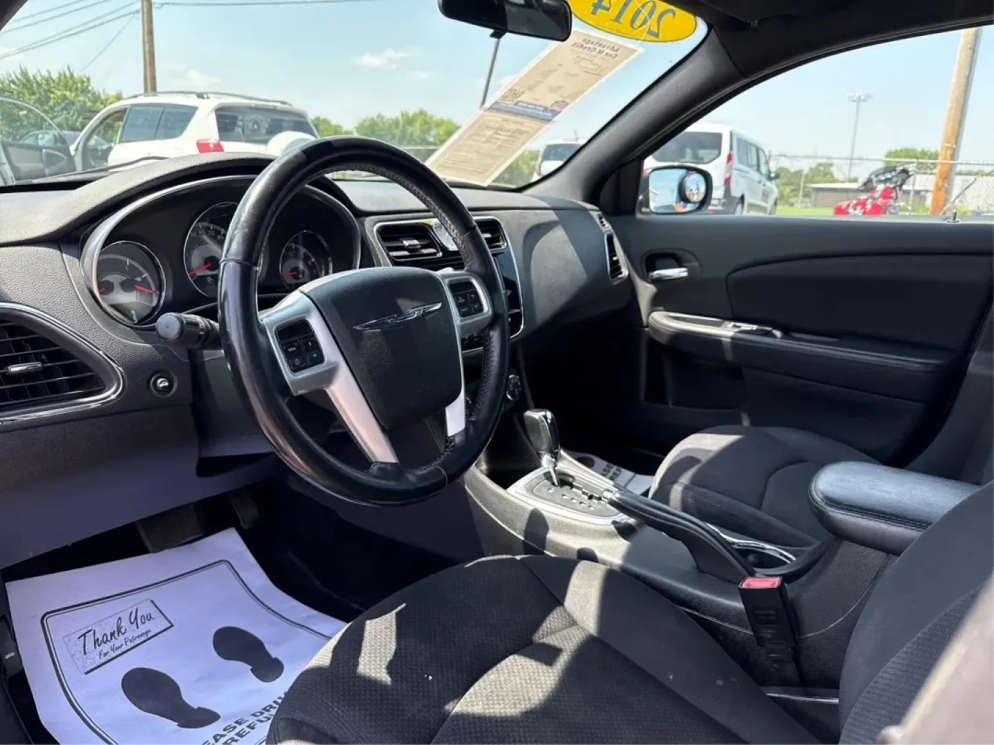 2014 Chrysler 200 Touring (1C3CCBBB6EN) with an Other engine, located at 8750 N County Rd 25A, Piqua, OH, 45356, (937) 908-9800, 40.164391, -84.232513 - **Discover Freedom and Comfort with this 2014 Chrysler 200 Touring at Advantage Car and Credit!**<br /> <br /> Are you ready to elevate your driving experience? Whether you're a busy professional looking for a reliable daily commuter or a growing family in need of a safe and stylish sedan, the 2014 - Photo#9