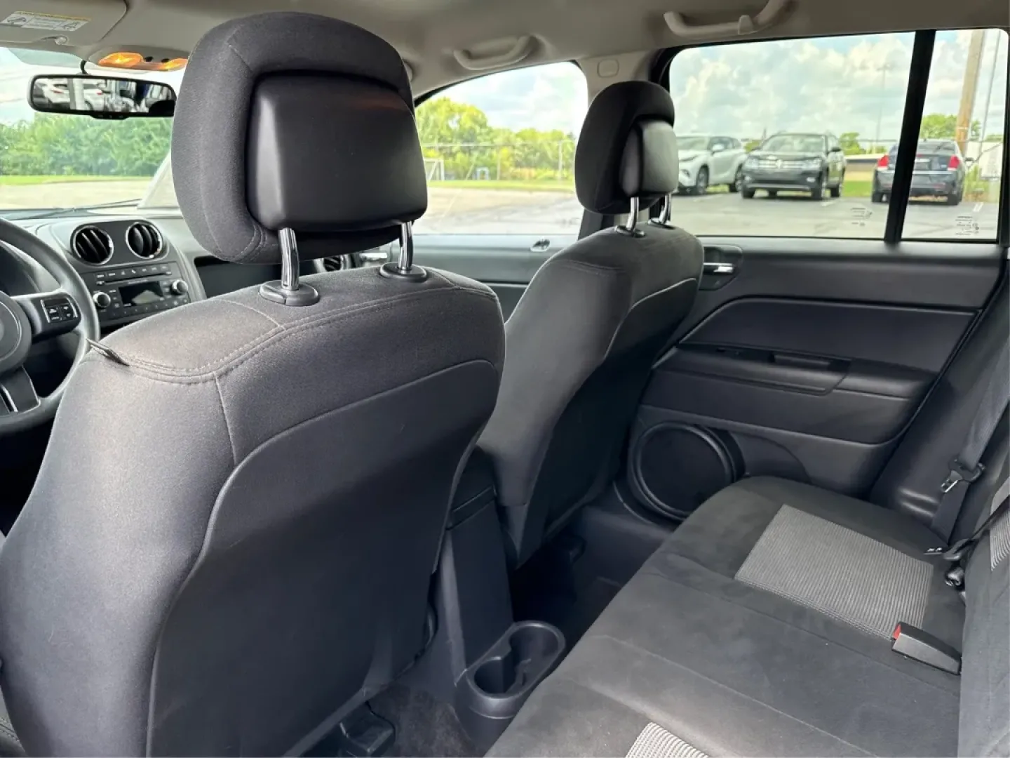 2014 Jeep Compass Sport (1C4NJDBB4ED) with an 2.4L I-4 DOHC engine, located at 1184 Kauffman Ave, Fairborn, OH, 45324, (937) 908-9800, 39.807072, -84.030914 - **Experience Adventure with the 2014 Jeep Compass Sport at Advantage Car and Credit Xenia!** <br /> <br /> Are you ready to embrace the open road with a vehicle that combines comfort, capability, and style? The 2014 Jeep Compass Sport, available at Advantage Car and Credit in Xenia, Ohio, is the pe - Photo#10