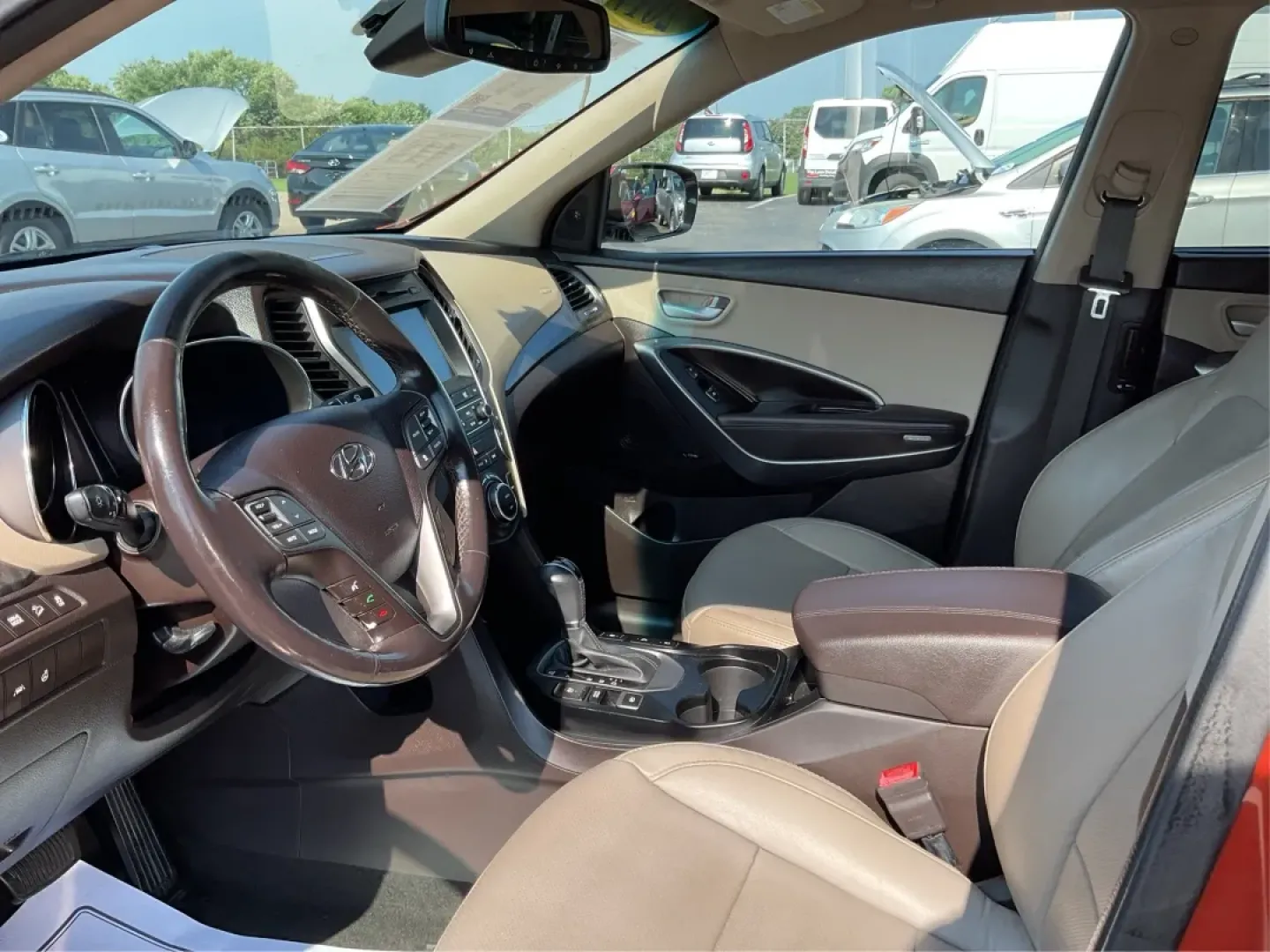 2017 Hyundai Santa Fe 2.0T Ultimate (5XYZW4LA5HG) with an Theta II 2L I-4 gasoline direct injection engine, located at 1230 East Main St, Xenia, OH, 45385, (937) 908-9800, 39.688026, -83.910172 - Are you ready to elevate your family adventures or commute comfortably while tackling any road with confidence? Look no further than this 2017 Hyundai Santa Fe 2.0T Ultimate, available now at Advantage Car and Credit in Fairborn, OH. This SUV is not just a vehicle; it's your ticket to creating unfor - Photo#9