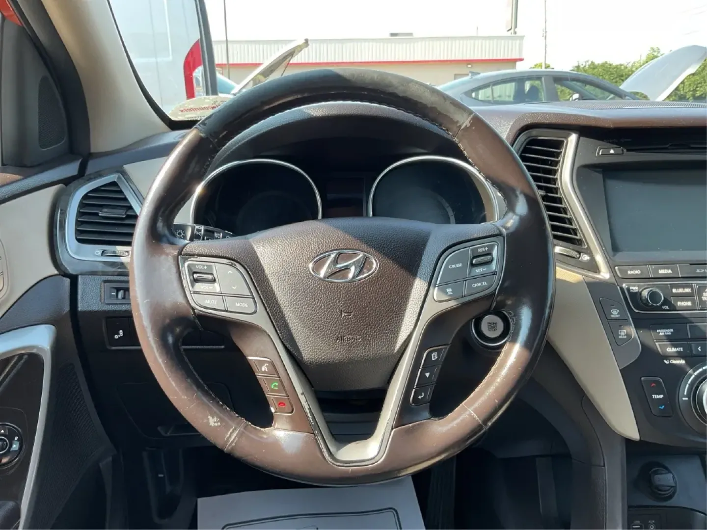2017 Hyundai Santa Fe 2.0T Ultimate (5XYZW4LA5HG) with an Theta II 2L I-4 gasoline direct injection engine, located at 1230 East Main St, Xenia, OH, 45385, (937) 908-9800, 39.688026, -83.910172 - Are you ready to elevate your family adventures or commute comfortably while tackling any road with confidence? Look no further than this 2017 Hyundai Santa Fe 2.0T Ultimate, available now at Advantage Car and Credit in Fairborn, OH. This SUV is not just a vehicle; it's your ticket to creating unfor - Photo#16