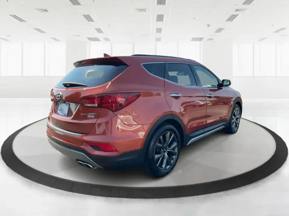 2017 Hyundai Santa Fe 2.0T Ultimate (5XYZW4LA5HG) with an Theta II 2L I-4 gasoline direct injection engine, 6A transmission, located at 1951 S Dayton Lakeview Rd., New Carlisle, OH, 45344, (937) 908-9800, 39.890999, -84.050255 - Are you ready to elevate your family adventures or commute comfortably while tackling any road with confidence? Look no further than this 2017 Hyundai Santa Fe 2.0T Ultimate, available now at Advantage Car and Credit in Fairborn, OH. This SUV is not just a vehicle; it's your ticket to creating unfor - Photo#2