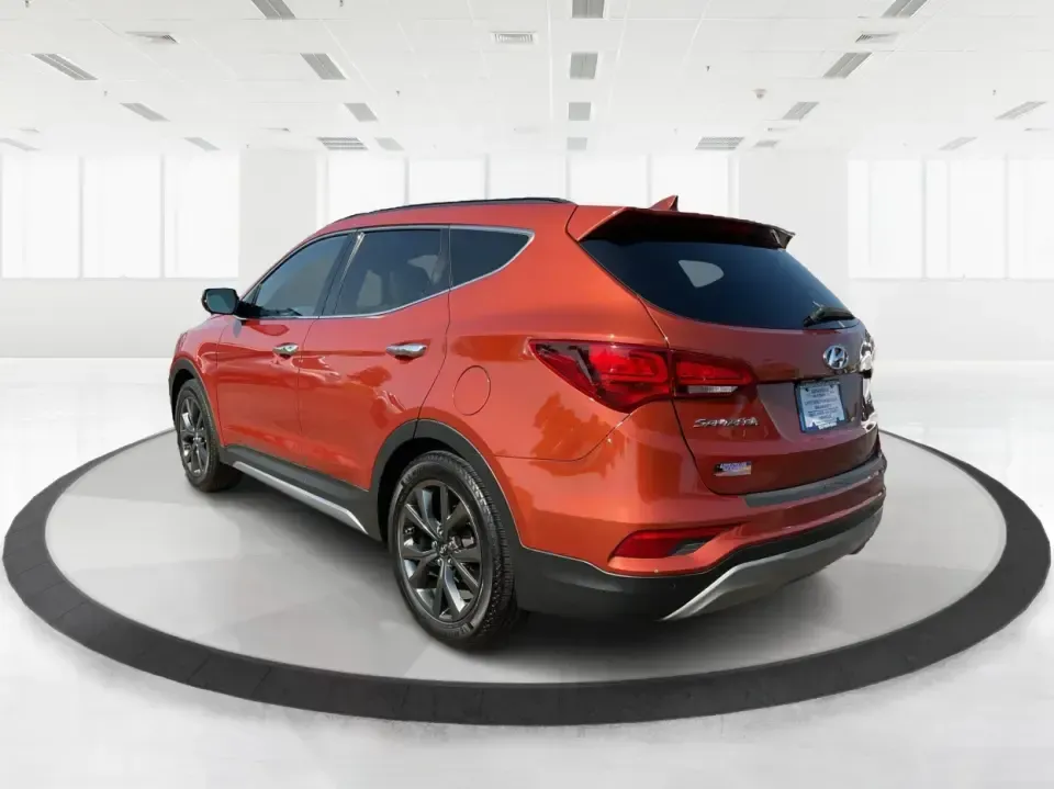 2017 Hyundai Santa Fe 2.0T Ultimate (5XYZW4LA5HG) with an Theta II 2L I-4 gasoline direct injection engine, 6A transmission, located at 1951 S Dayton Lakeview Rd., New Carlisle, OH, 45344, (937) 908-9800, 39.890999, -84.050255 - Are you ready to elevate your family adventures or commute comfortably while tackling any road with confidence? Look no further than this 2017 Hyundai Santa Fe 2.0T Ultimate, available now at Advantage Car and Credit in Fairborn, OH. This SUV is not just a vehicle; it's your ticket to creating unfor - Photo#4