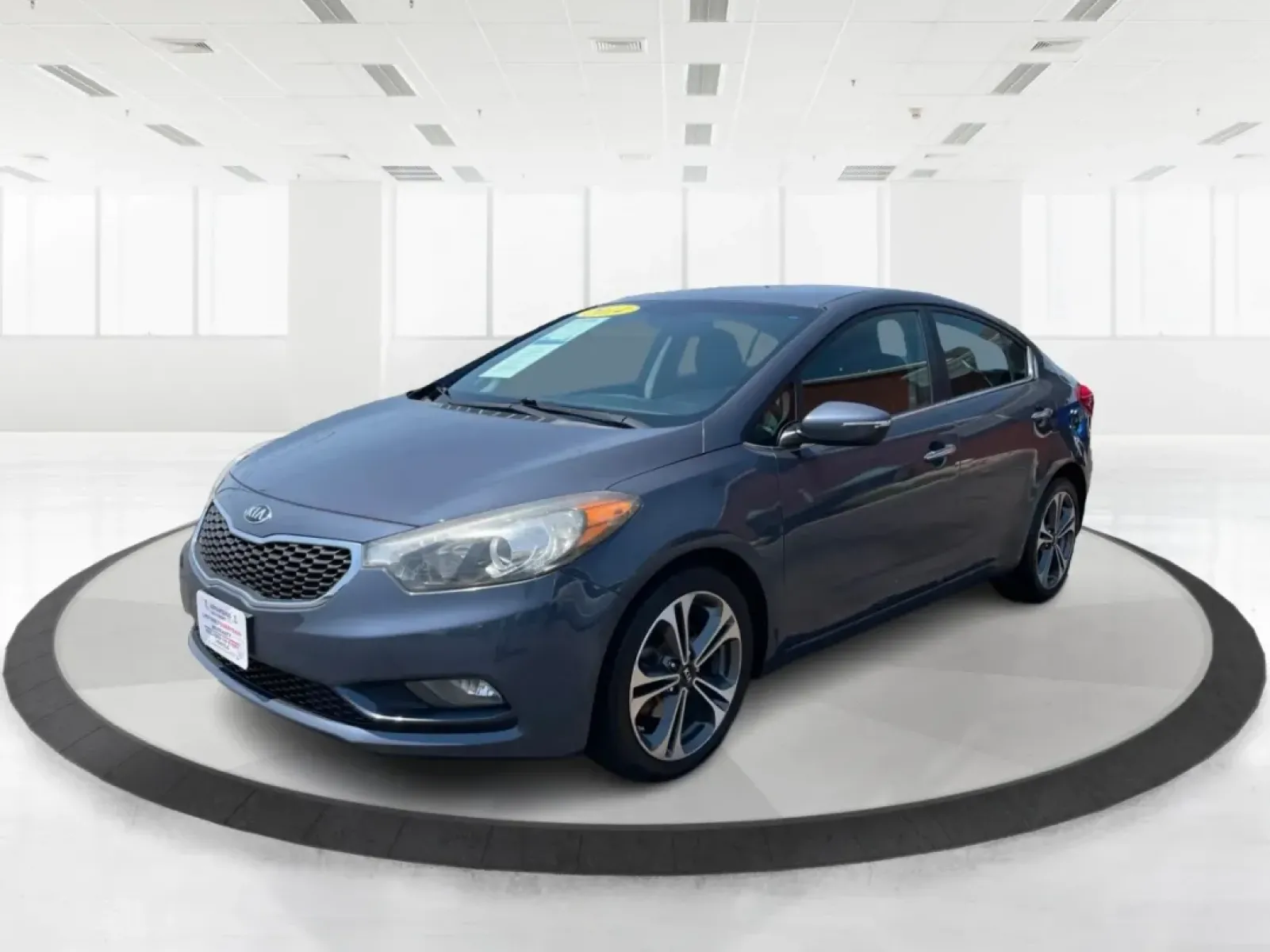 2014 Kia Forte EX (KNAFX4A88E5) with an 2L I-4 gasoline direct injection engine, located at 8750 N County Rd 25A, Piqua, OH, 45356, (937) 908-9800, 40.164391, -84.232513 - **Elevate Your Everyday Commute with the 2014 Kia Forte EX Perfect for the Modern Lifestyle**<br /> <br /> Looking for a reliable vehicle that effortlessly combines style, comfort, and affordability? The 2014 Kia Forte EX is the perfect choice for budget-conscious buyers and growing families alike. - Photo#8