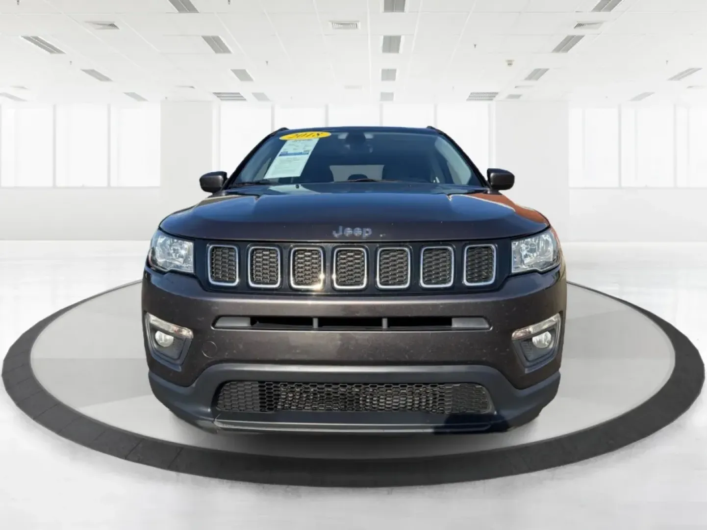 2018 Jeep Compass Latitude FWD (3C4NJCBB1JT) with an 2.4L I-4 variable valve control engine, Automatic transmission, located at 1951 S Dayton Lakeview Rd., New Carlisle, OH, 45344, (937) 908-9800, 39.890999, -84.050255 - **Adventure Awaits with This 2018 Jeep Compass Latitude FWD!**<br /> <br /> Transform your everyday travels into unforgettable adventures with the 2018 Jeep Compass Latitude FWD. This SUV is not just a mode of transportation; it's your ticket to exploration, whether it's cruising through the scenic - Photo#7