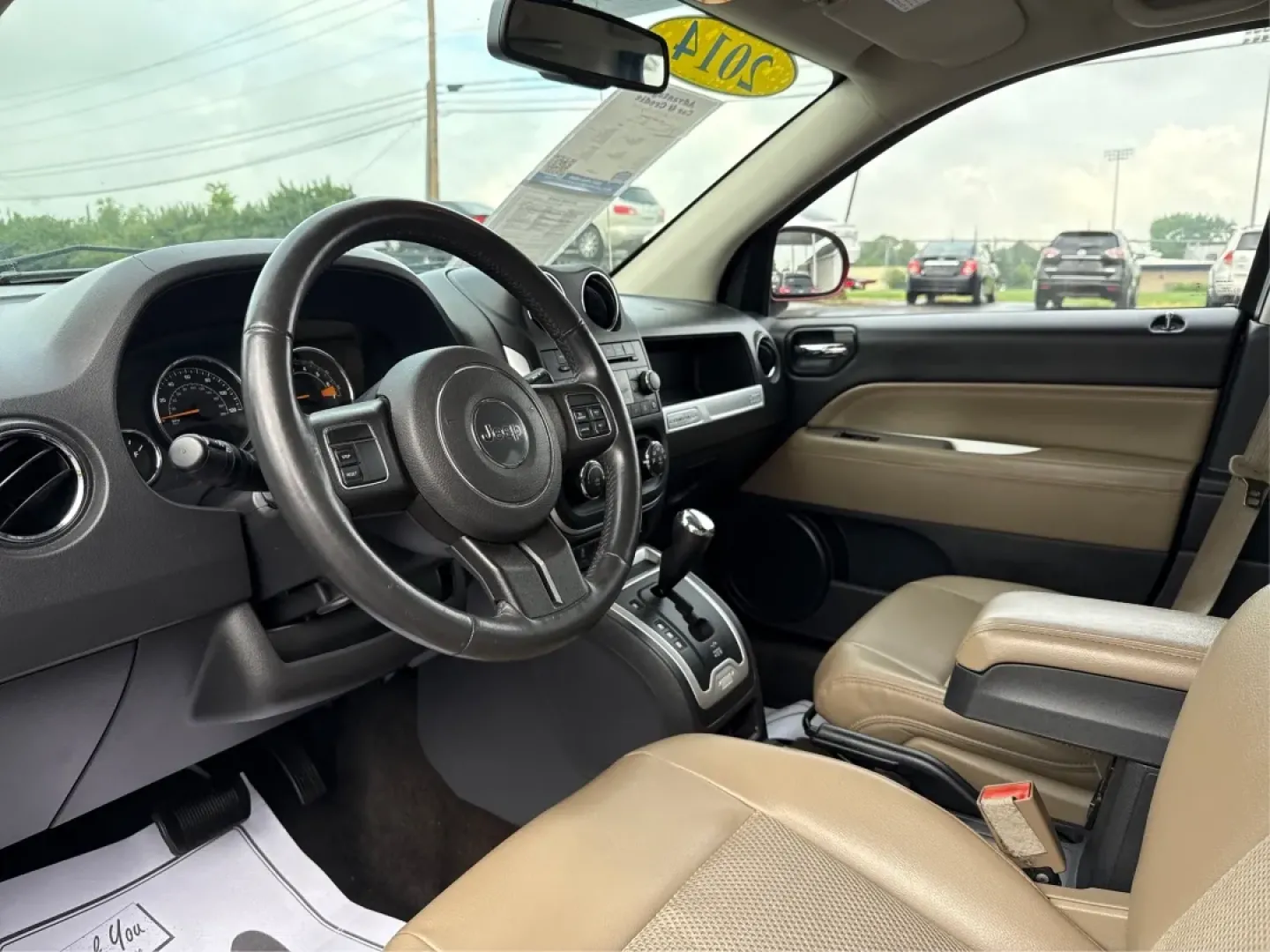 2014 Jeep Compass Latitude (1C4NJDEBXED) with an 2.4L I-4 DOHC engine, Continuously Variable Transmission transmission, located at 1230 East Main St, Xenia, OH, 45385, (937) 908-9800, 39.688026, -83.910172 - **Discover Your Adventure with the 2014 Jeep Compass Latitude Perfect for Family Road Trips or Daily Commutes!**<br /> <br /> Are you ready to elevate your driving experience? The 2014 Jeep Compass Latitude is not just a vehicle; it's a lifestyle. Whether you're navigating busy city streets in Fair - Photo#9