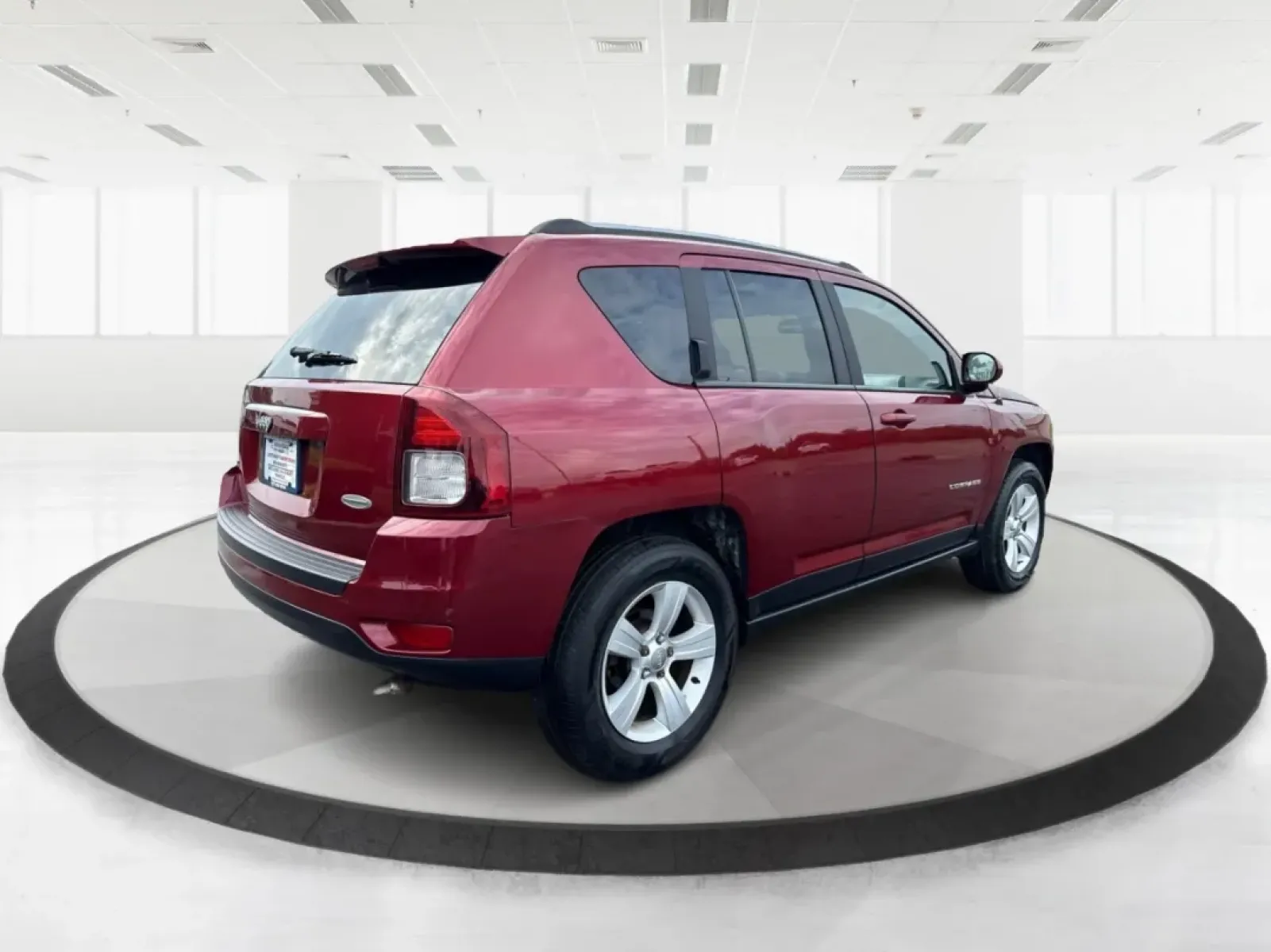 2014 Jeep Compass Latitude (1C4NJDEBXED) with an 2.4L I-4 DOHC engine, located at 8750 N County Rd 25A, Piqua, OH, 45356, (937) 908-9800, 40.164391, -84.232513 - **Discover Your Adventure with the 2014 Jeep Compass Latitude Perfect for Family Road Trips or Daily Commutes!**<br /> <br /> Are you ready to elevate your driving experience? The 2014 Jeep Compass Latitude is not just a vehicle; it's a lifestyle. Whether you're navigating busy city streets in Fair - Photo#2