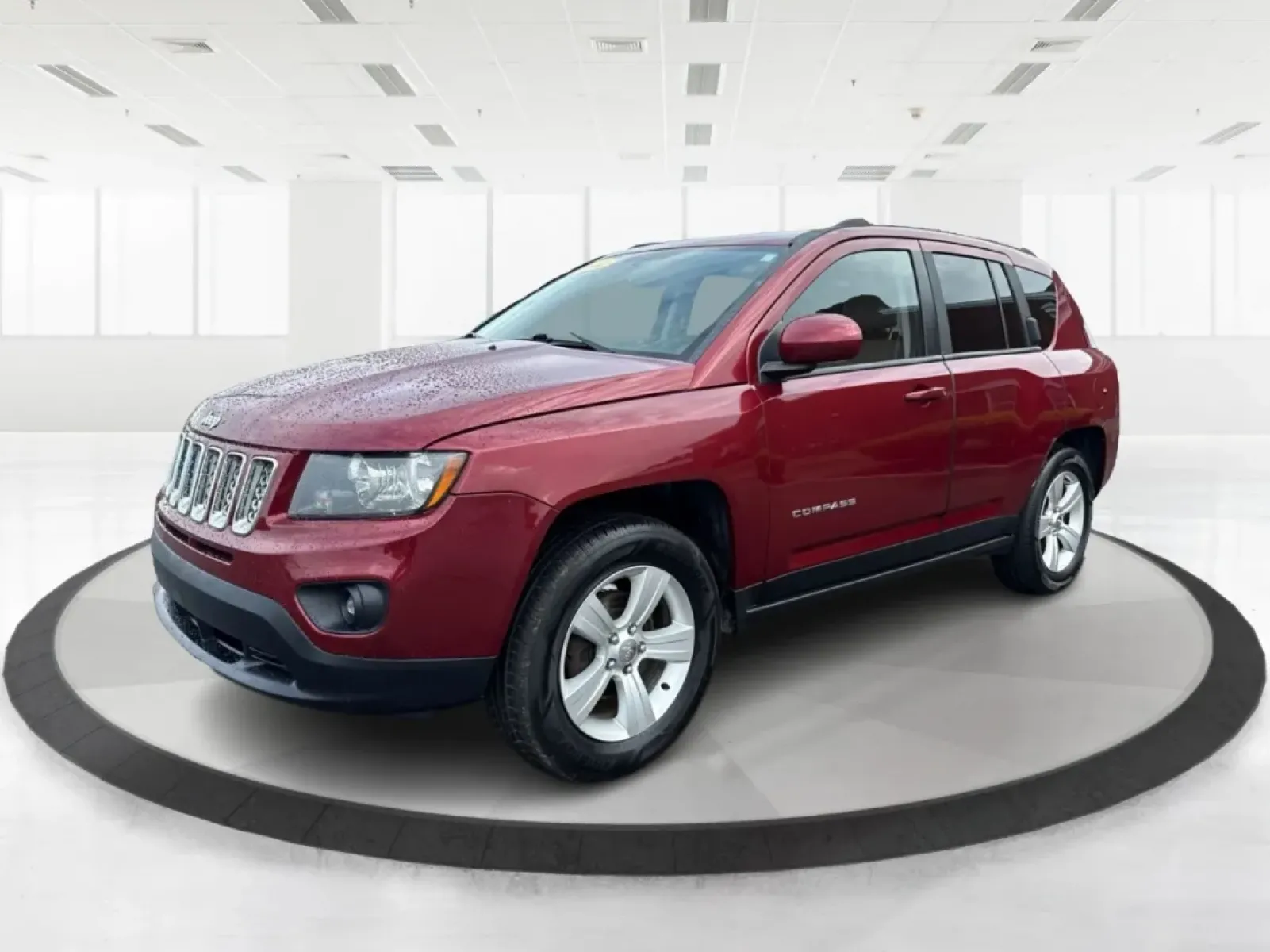 2014 Jeep Compass Latitude (1C4NJDEBXED) with an 2.4L I-4 DOHC engine, located at 8750 N County Rd 25A, Piqua, OH, 45356, (937) 908-9800, 40.164391, -84.232513 - **Discover Your Adventure with the 2014 Jeep Compass Latitude Perfect for Family Road Trips or Daily Commutes!**<br /> <br /> Are you ready to elevate your driving experience? The 2014 Jeep Compass Latitude is not just a vehicle; it's a lifestyle. Whether you're navigating busy city streets in Fair - Photo#8
