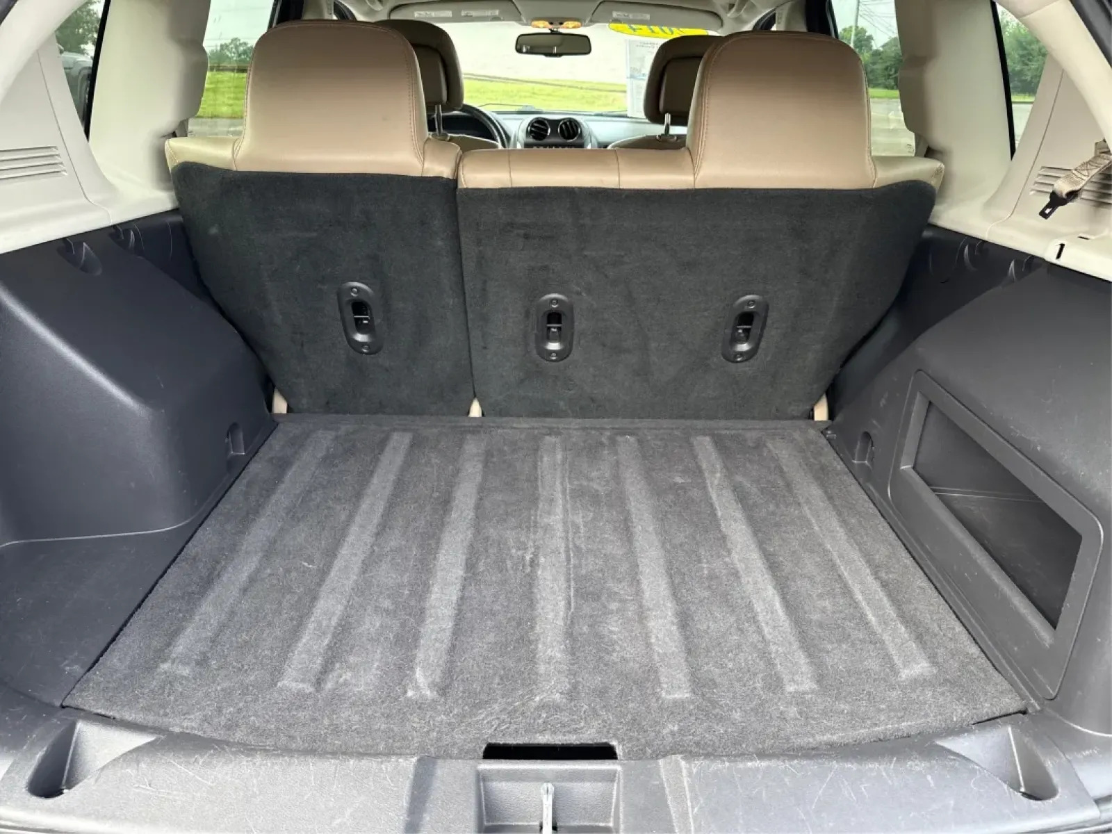 2014 Jeep Compass Latitude (1C4NJDEBXED) with an 2.4L I-4 DOHC engine, located at 8750 N County Rd 25A, Piqua, OH, 45356, (937) 908-9800, 40.164391, -84.232513 - **Discover Your Adventure with the 2014 Jeep Compass Latitude Perfect for Family Road Trips or Daily Commutes!**<br /> <br /> Are you ready to elevate your driving experience? The 2014 Jeep Compass Latitude is not just a vehicle; it's a lifestyle. Whether you're navigating busy city streets in Fair - Photo#12