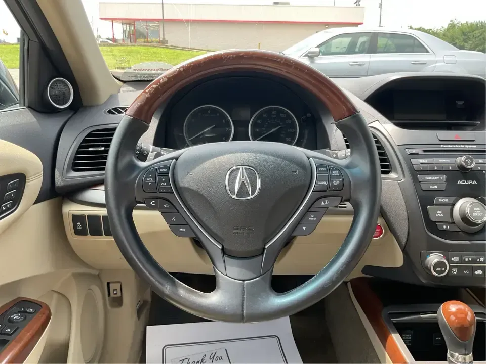 2014 Acura RDX Base (5J8TB3H39EL) with an 2.3L L4 DOHC 16V engine, 6-Speed Automatic transmission, located at 880 E. National Road, Vandalia, OH, 45377, (937) 908-9800, 39.891918, -84.183594 - Unleash the perfect blend of comfort and versatility with the 2014 Acura RDX, a crossover that caters to both your daily grind and weekend adventures. Whether you're a growing family seeking spaciousness, a commuter looking for reliability, or a weekend warrior ready for road trips, this vehicle has - Photo#16