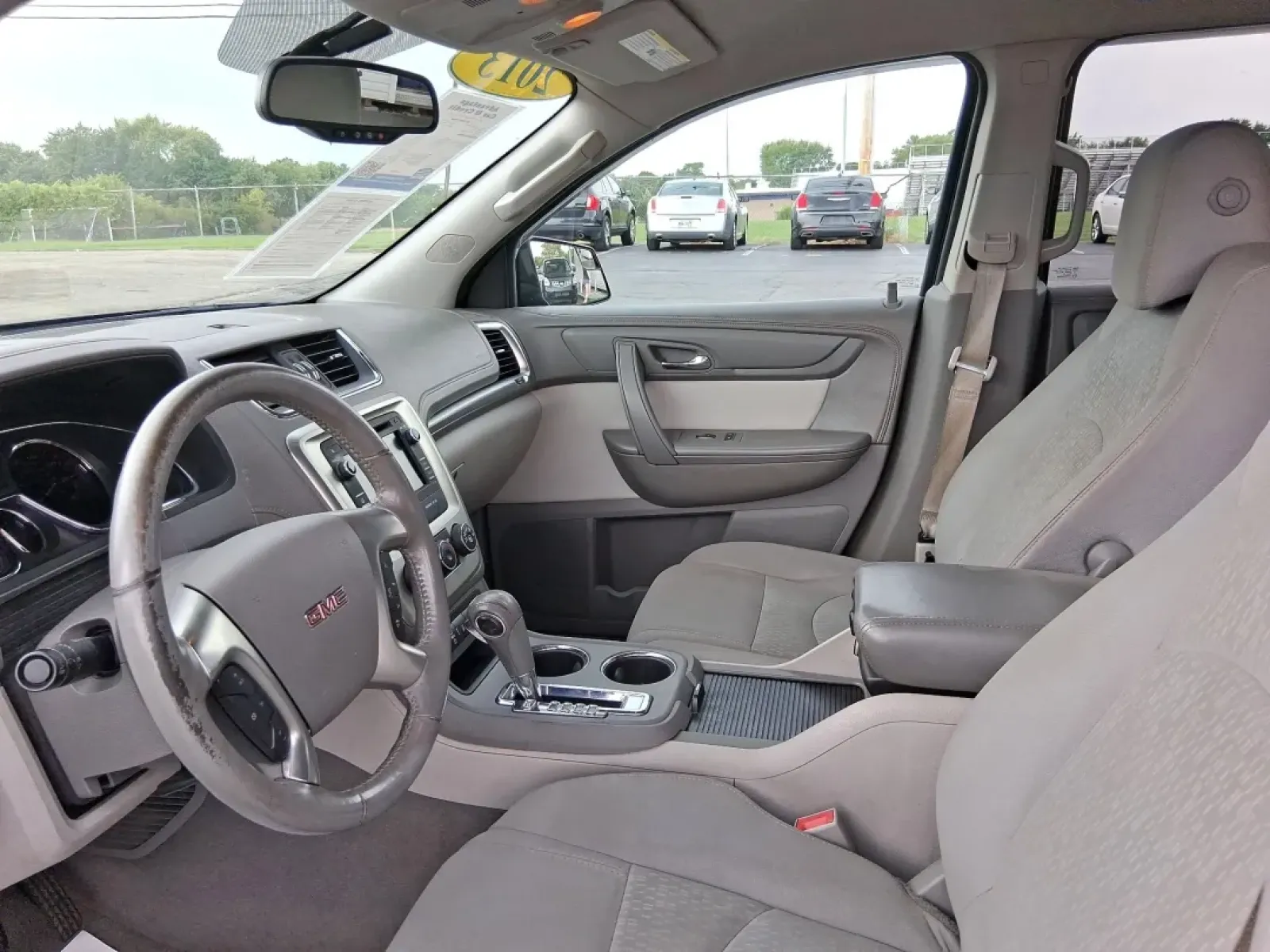 2013 GMC Acadia SLE-2 FWD (1GKKRPKD1DJ) with an 3.6L V6 DOHC 24V engine, 6-Speed Automatic transmission, located at 8750 N County Rd 25A, Piqua, OH, 45356, (937) 908-9800, 40.164391, -84.232513 - Discover the perfect blend of comfort and capability with the 2013 GMC Acadia SLE-2, now available at Advantage Car and Credit - Piqua, located at 8750 N County Rd 25A, Piqua, OH 45356. This versatile SUV is ideal for families, weekend adventurers, and budget-conscious buyers seeking a reliable vehi - Photo#9