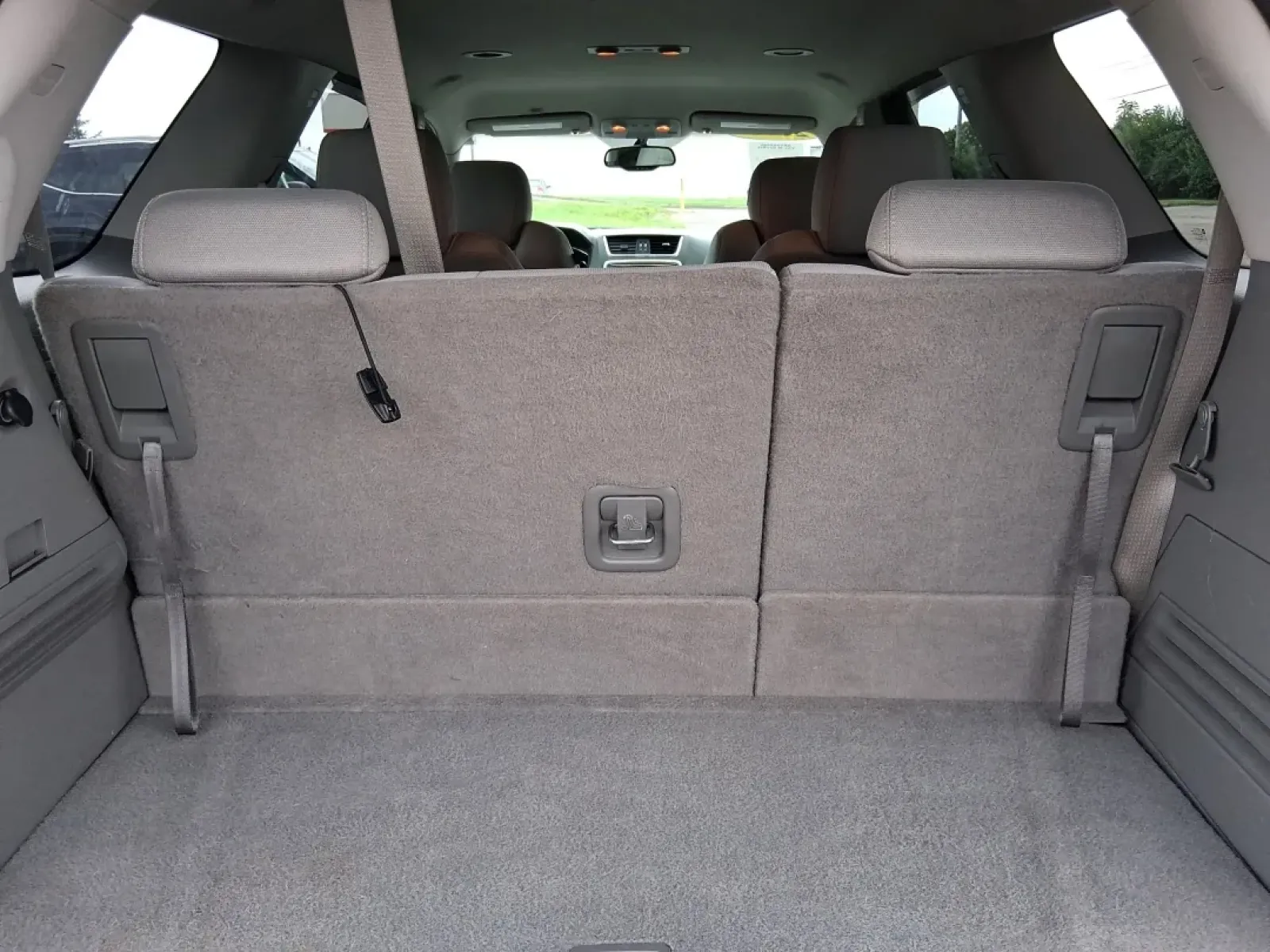 2013 GMC Acadia SLE-2 FWD (1GKKRPKD1DJ) with an 3.6L V6 DOHC 24V engine, 6-Speed Automatic transmission, located at 8750 N County Rd 25A, Piqua, OH, 45356, (937) 908-9800, 40.164391, -84.232513 - Discover the perfect blend of comfort and capability with the 2013 GMC Acadia SLE-2, now available at Advantage Car and Credit - Piqua, located at 8750 N County Rd 25A, Piqua, OH 45356. This versatile SUV is ideal for families, weekend adventurers, and budget-conscious buyers seeking a reliable vehi - Photo#12