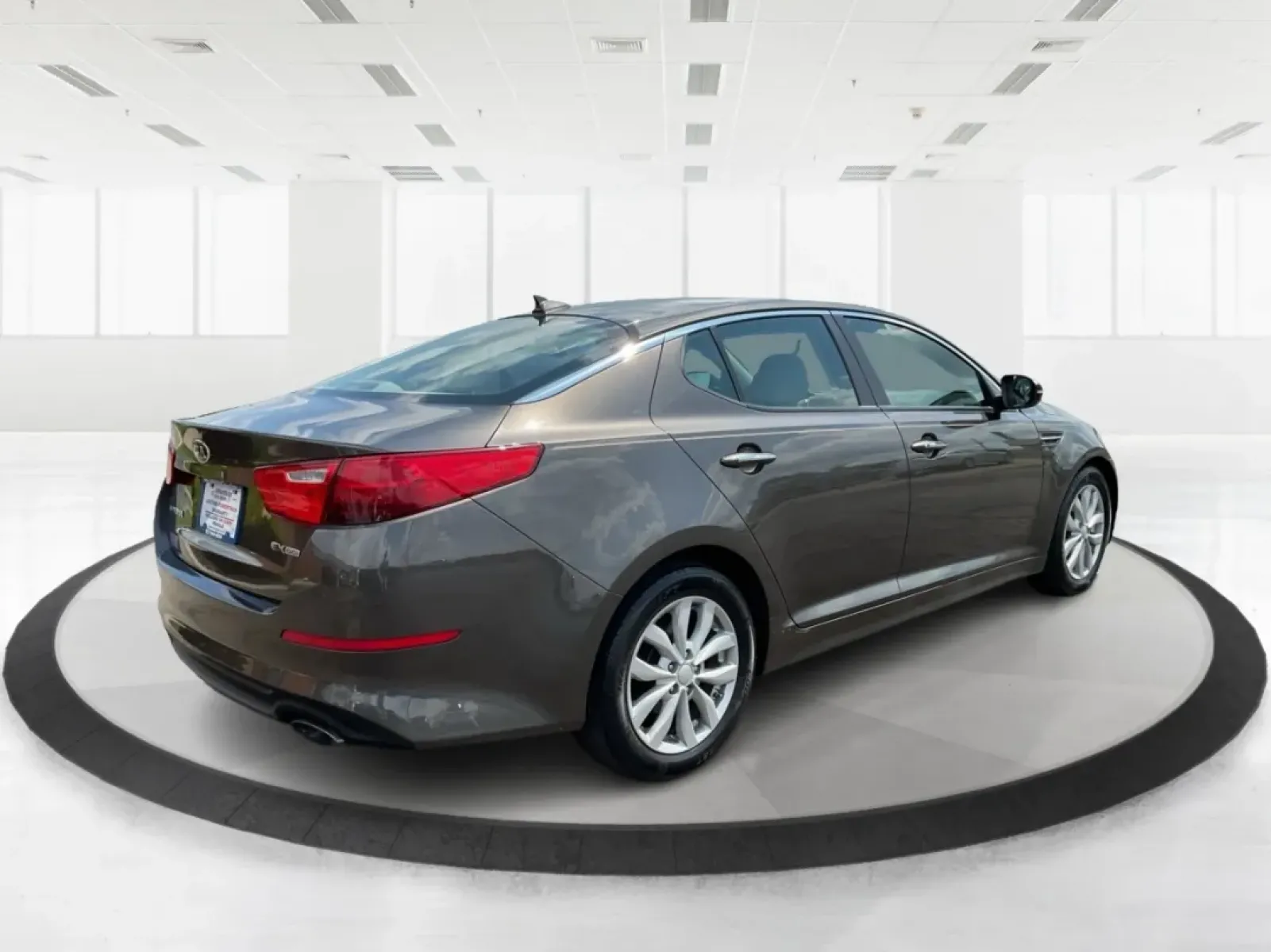 2015 Kia Optima EX (5XXGN4A70FG) with an Theta II 2.4L I-4 gasoline direct injection engine, located at 8750 N County Rd 25A, Piqua, OH, 45356, (937) 908-9800, 40.164391, -84.232513 - Embrace the open road with confidence and style in this stunning 2015 Kia Optima EX, available at Advantage Car and Credit - Piqua! Whether you're navigating daily commutes, embarking on weekend getaways, or shuttling your growing family, this sedan is designed to enhance every journey. With a sleek - Photo#2