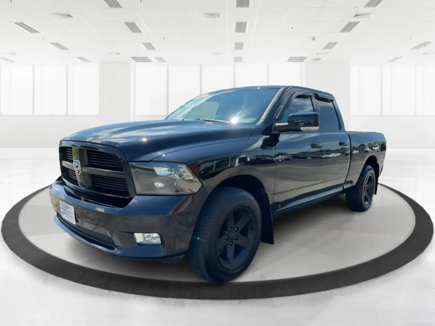 2012 Ram 1500 Sport Quad Cab 4WD (1C6RD7HT2CS) with an 5.7L V8 OHV 16V engine, 6-Speed Automatic transmission, located at 1230 East Main St, Xenia, OH, 45385, (937) 908-9800, 39.688026, -83.910172 - **Adventure Awaits: Discover the 2012 Ram 1500 Sport Quad Cab 4WD at Advantage Car and Credit in Xenia, OH!**<br /> <br /> Are you ready to elevate your lifestyle with a vehicle that can handle your adventurous spirit? Whether you're tackling weekend getaways, handling family trips, or just commutin - Photo#8