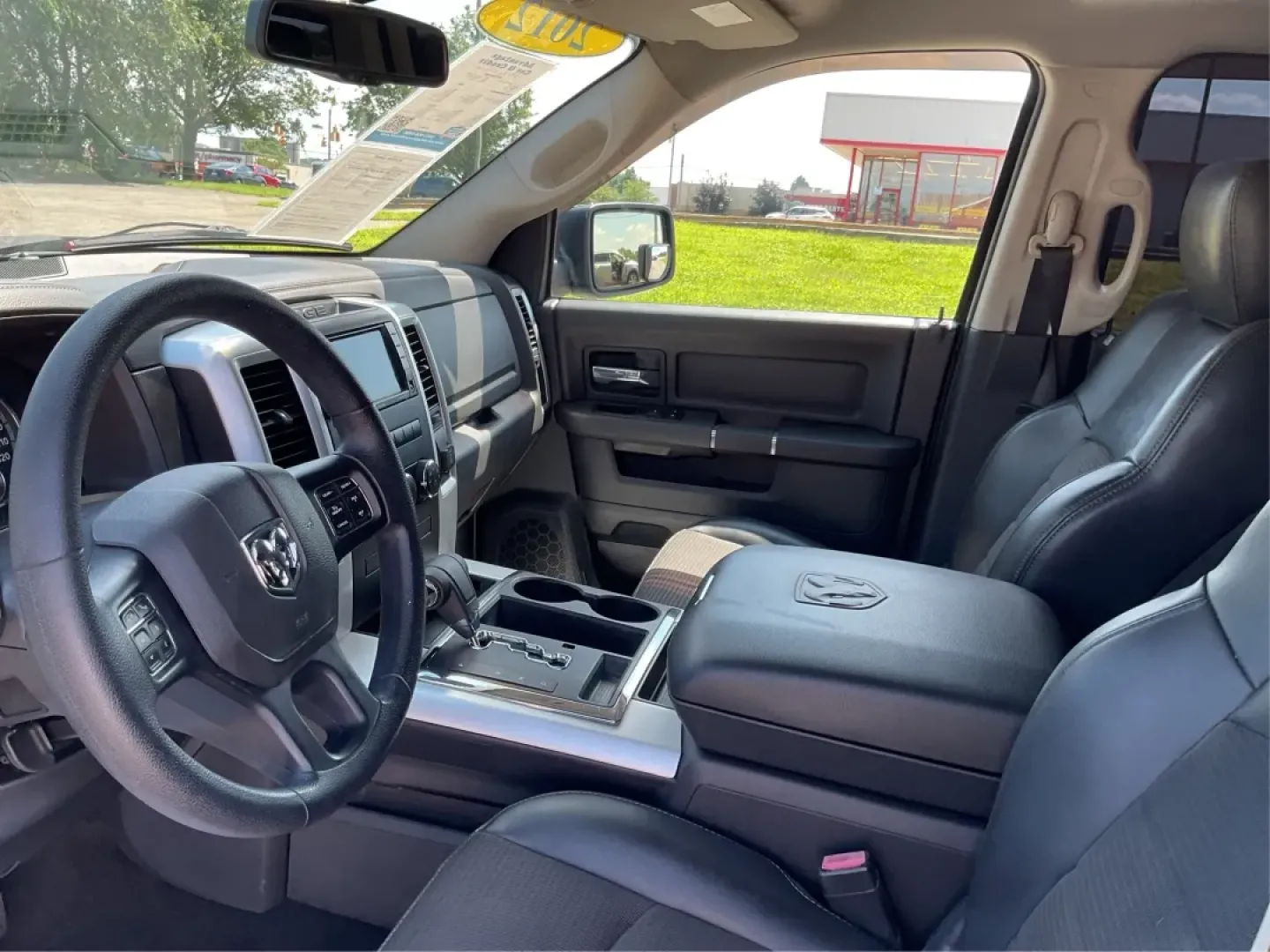2012 Ram 1500 Sport Quad Cab 4WD (1C6RD7HT2CS) with an 5.7L V8 OHV 16V engine, 6-Speed Automatic transmission, located at 1230 East Main St, Xenia, OH, 45385, (937) 908-9800, 39.688026, -83.910172 - **Adventure Awaits: Discover the 2012 Ram 1500 Sport Quad Cab 4WD at Advantage Car and Credit in Xenia, OH!**<br /> <br /> Are you ready to elevate your lifestyle with a vehicle that can handle your adventurous spirit? Whether you're tackling weekend getaways, handling family trips, or just commutin - Photo#9