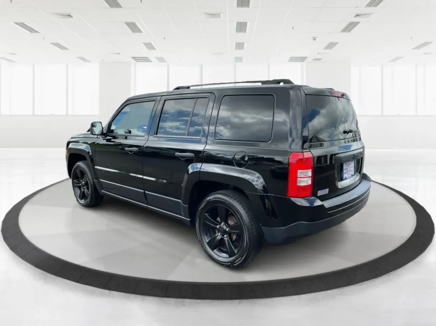 2015 Jeep Patriot Sport 2WD (1C4NJPBA6FD) with an 2.0L L4 DOHC 16V engine, located at 1099 N County Rd 25A , Troy, OH, 45373, (937) 908-9800, 40.057079, -84.212883 - **Adventure Awaits in the 2015 Jeep Patriot Your Perfect Companion for Weekend Getaways!**<br /> <br /> Imagine hitting the open road with the wind in your hair, the sound of your favorite playlist filling the cabin, and the freedom to explore every hidden gem along the way. The 2015 Jeep Patriot i - Photo#4