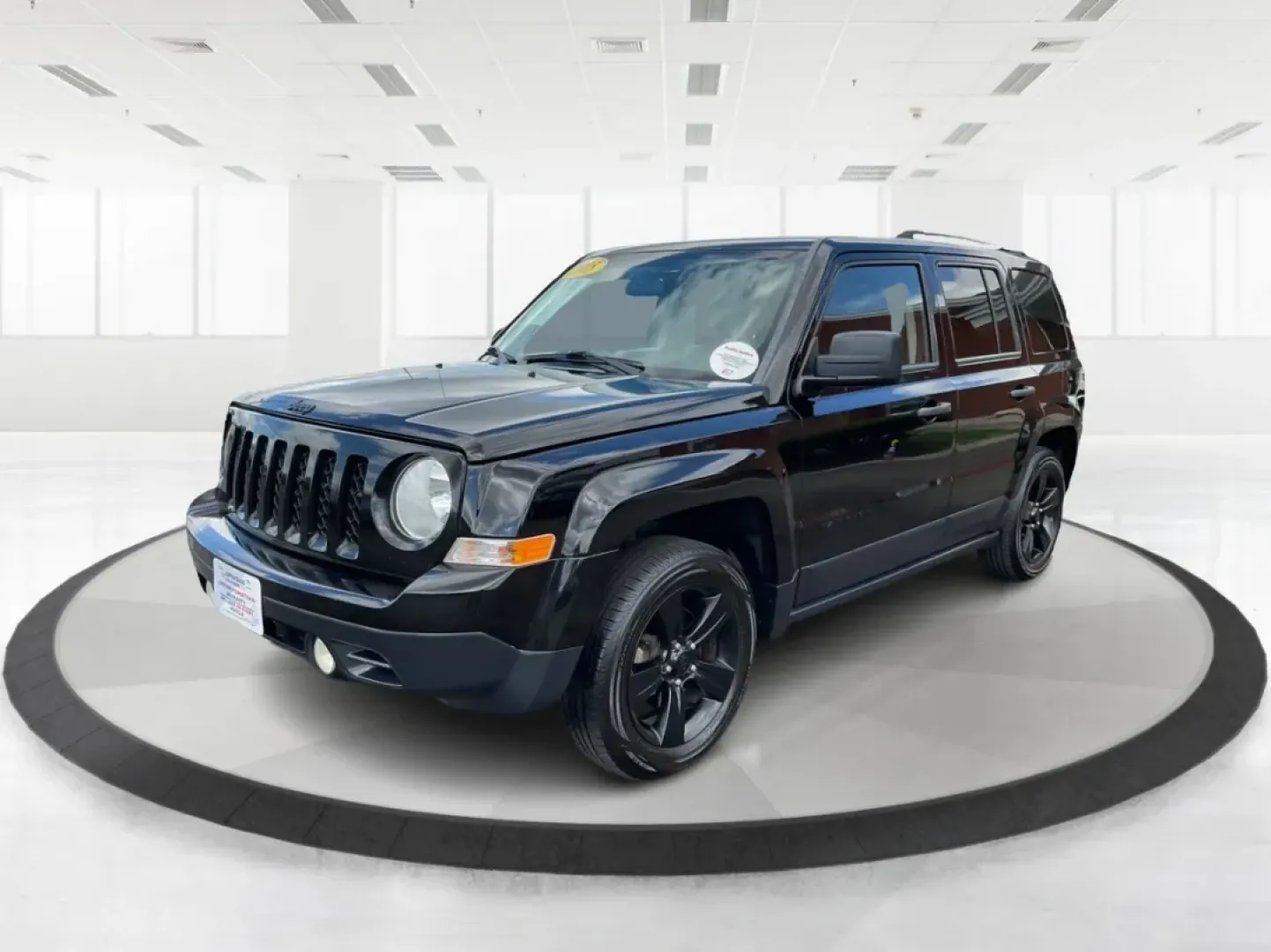 2015 Jeep Patriot Sport 2WD (1C4NJPBA6FD) with an 2.0L L4 DOHC 16V engine, located at 1099 N County Rd 25A , Troy, OH, 45373, (937) 908-9800, 40.057079, -84.212883 - **Adventure Awaits in the 2015 Jeep Patriot Your Perfect Companion for Weekend Getaways!**<br /> <br /> Imagine hitting the open road with the wind in your hair, the sound of your favorite playlist filling the cabin, and the freedom to explore every hidden gem along the way. The 2015 Jeep Patriot i - Photo#8