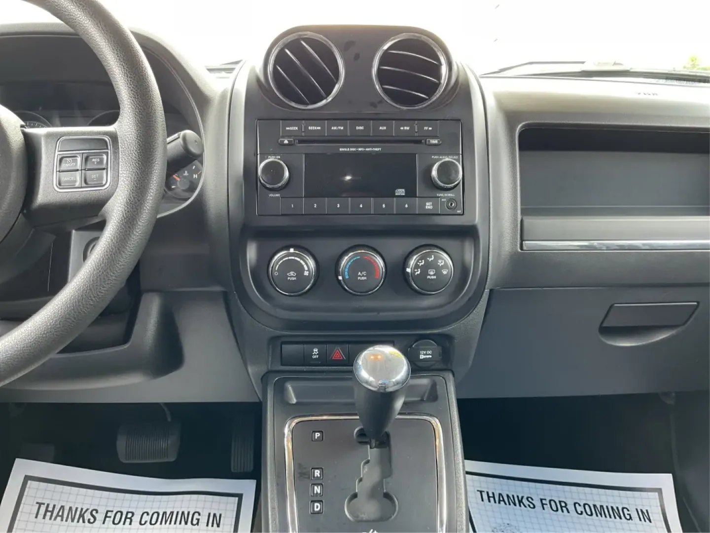 2015 Jeep Patriot Sport 2WD (1C4NJPBA6FD) with an 2.0L L4 DOHC 16V engine, located at 1099 N County Rd 25A , Troy, OH, 45373, (937) 908-9800, 40.057079, -84.212883 - **Adventure Awaits in the 2015 Jeep Patriot Your Perfect Companion for Weekend Getaways!**<br /> <br /> Imagine hitting the open road with the wind in your hair, the sound of your favorite playlist filling the cabin, and the freedom to explore every hidden gem along the way. The 2015 Jeep Patriot i - Photo#13