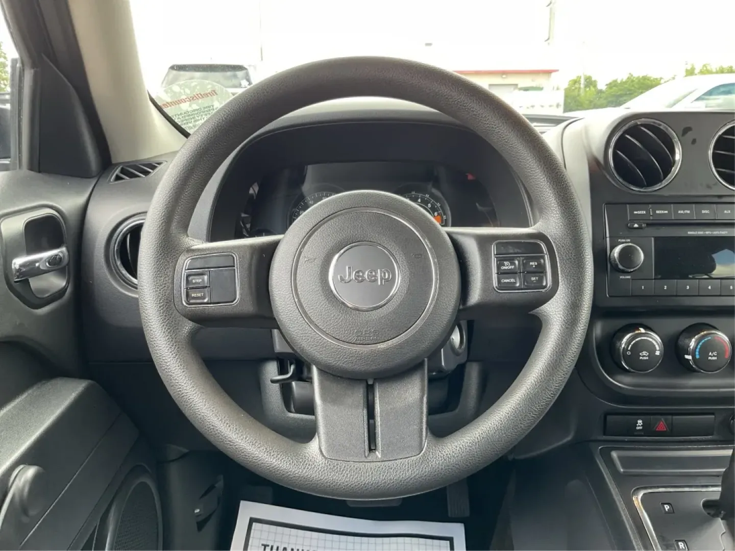 2015 Jeep Patriot Sport 2WD (1C4NJPBA6FD) with an 2.0L L4 DOHC 16V engine, located at 1099 N County Rd 25A , Troy, OH, 45373, (937) 908-9800, 40.057079, -84.212883 - **Adventure Awaits in the 2015 Jeep Patriot Your Perfect Companion for Weekend Getaways!**<br /> <br /> Imagine hitting the open road with the wind in your hair, the sound of your favorite playlist filling the cabin, and the freedom to explore every hidden gem along the way. The 2015 Jeep Patriot i - Photo#16