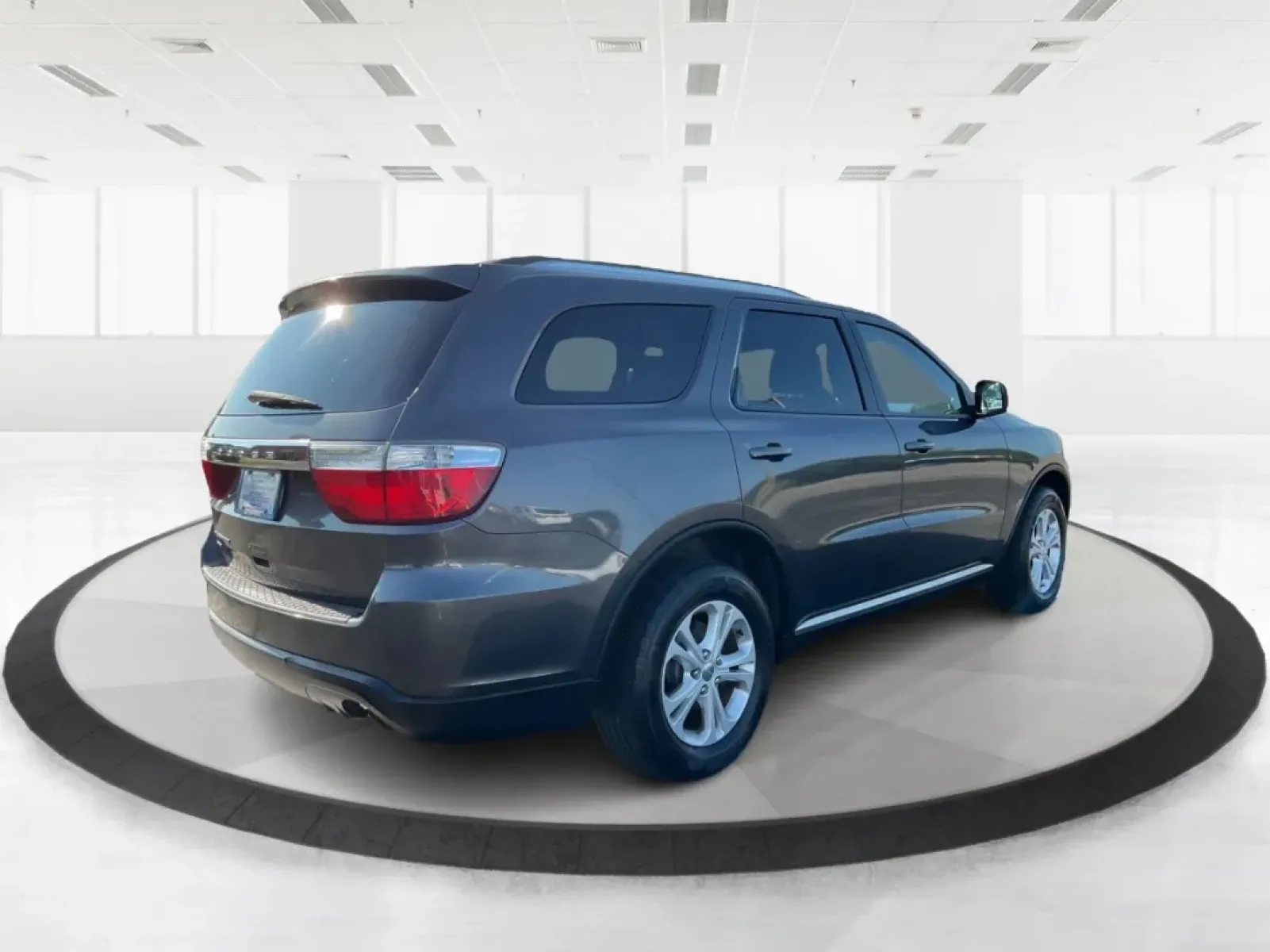 2013 Dodge Durango SXT (1C4RDJAG7DC) with an 3.6L V-6 DOHC engine, located at 1230 East Main St, Xenia, OH, 45385, (937) 908-9800, 39.688026, -83.910172 - **Discover Your Adventure with the 2013 Dodge Durango SXT at Advantage Car and Credit - Troy!**<br /> <br /> Are you in search of the perfect SUV to elevate your family outings, weekend adventures, or daily commutes? Look no further than the 2013 Dodge Durango SXT, where spaciousness meets versatili - Photo#2