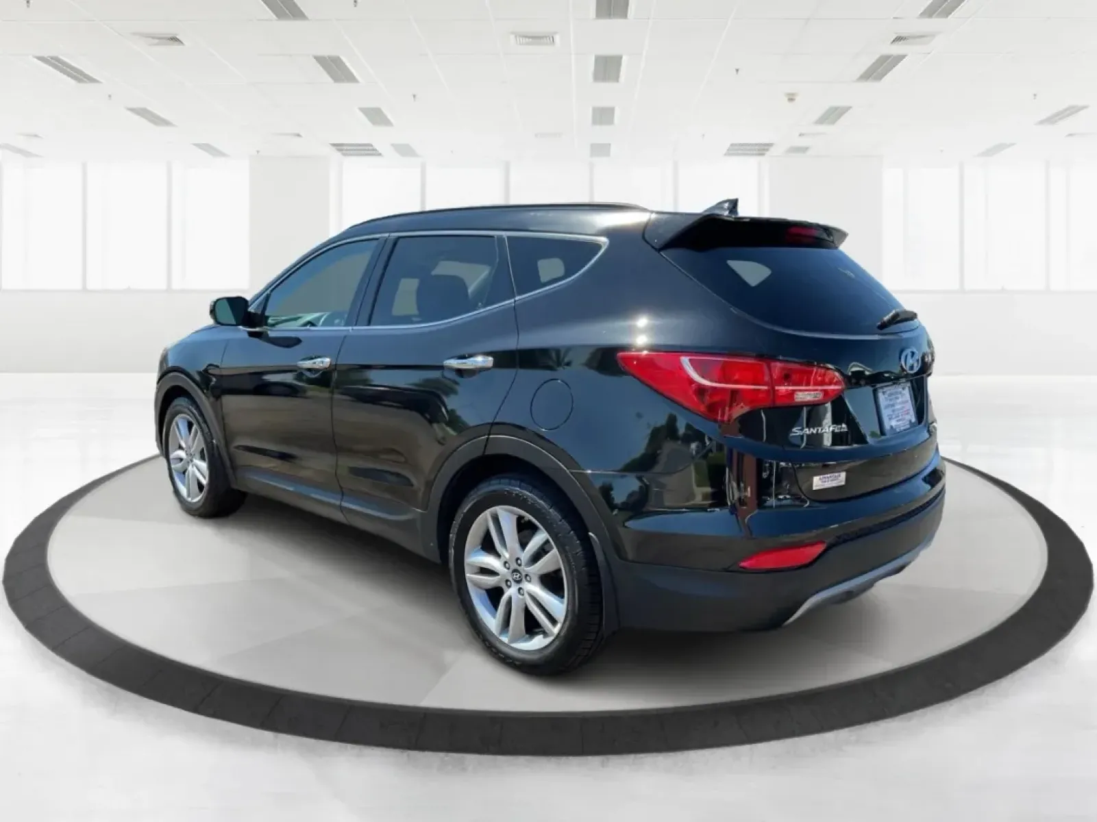 2014 Hyundai Santa Fe 2.0L Turbo (5XYZUDLA5EG) with an Theta II 2L I-4 gasoline direct injection engine, located at 8750 N County Rd 25A, Piqua, OH, 45356, (937) 908-9800, 40.164391, -84.232513 - Experience the thrill of adventure and family outings with our stunning 2014 Hyundai Santa Fe, available now at Advantage Car and Credit - Piqua, your friendly Buy Here Pay Here dealership located at 8750 N County Rd 25A, Piqua, OH 45356. This versatile SUV is designed for those who crave comfort, r - Photo#4