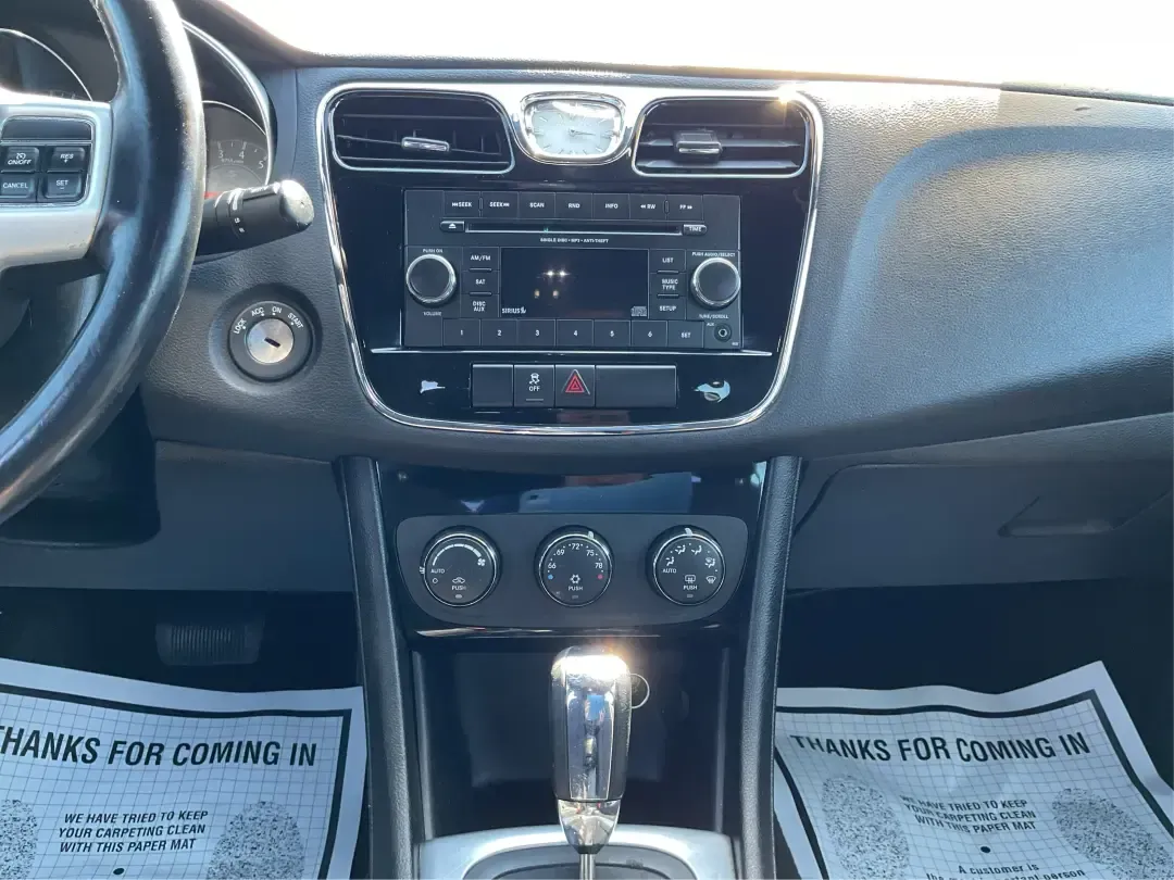 2012 Chrysler 200 Touring (1C3CCBBG4CN) with an 3.6L V6 DOHC 24V FFV engine, 6-Speed Automatic transmission, located at 1230 East Main St, Xenia, OH, 45385, (937) 908-9800, 39.688026, -83.910172 - Unleash your driving potential with the perfect blend of style, comfort, and functionality-ideal for growing families or anyone seeking a reliable commuter vehicle. Introducing the 2012 Chrysler 200 Touring sedan, now available at Advantage Car and Credit in Troy, OH. Located at 1099 N County Rd 25A - Photo#13