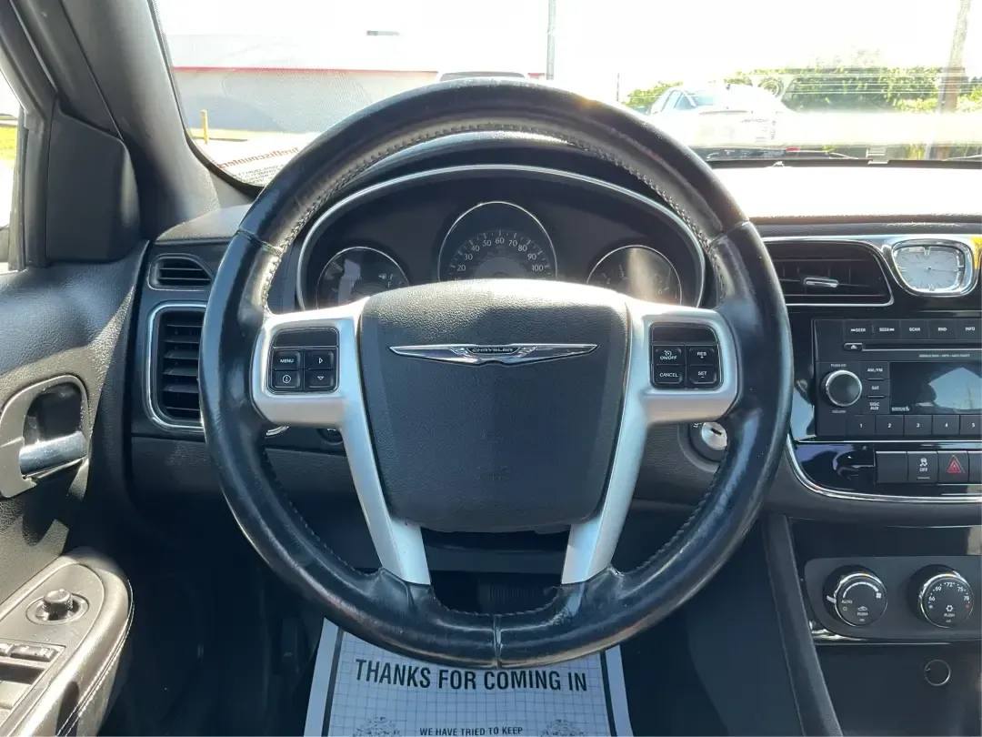 2012 Chrysler 200 Touring (1C3CCBBG4CN) with an 3.6L V6 DOHC 24V FFV engine, 6-Speed Automatic transmission, located at 1230 East Main St, Xenia, OH, 45385, (937) 908-9800, 39.688026, -83.910172 - Unleash your driving potential with the perfect blend of style, comfort, and functionality-ideal for growing families or anyone seeking a reliable commuter vehicle. Introducing the 2012 Chrysler 200 Touring sedan, now available at Advantage Car and Credit in Troy, OH. Located at 1099 N County Rd 25A - Photo#16