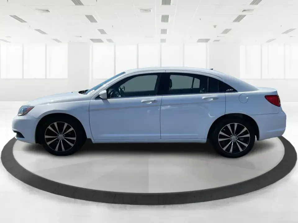 2012 Chrysler 200 Touring (1C3CCBBG4CN) with an 3.6L V6 DOHC 24V FFV engine, 6-Speed Automatic transmission, located at 1230 East Main St, Xenia, OH, 45385, (937) 908-9800, 39.688026, -83.910172 - Unleash your driving potential with the perfect blend of style, comfort, and functionality-ideal for growing families or anyone seeking a reliable commuter vehicle. Introducing the 2012 Chrysler 200 Touring sedan, now available at Advantage Car and Credit in Troy, OH. Located at 1099 N County Rd 25A - Photo#5