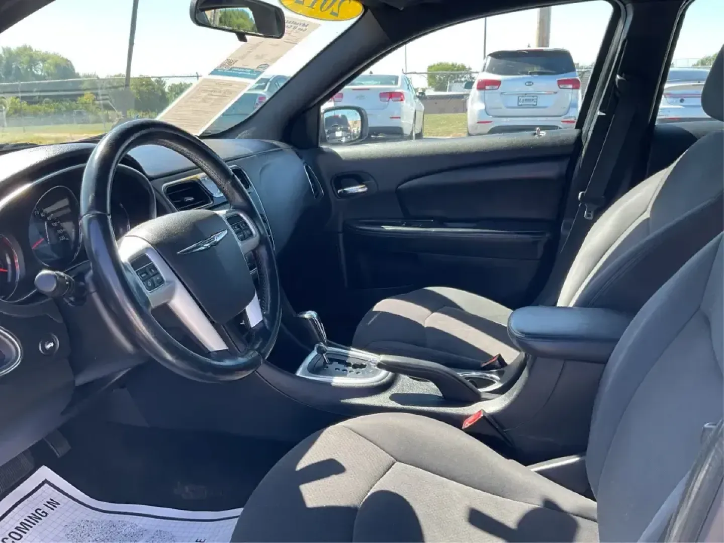 2012 Chrysler 200 Touring (1C3CCBBG4CN) with an 3.6L V6 DOHC 24V FFV engine, 6-Speed Automatic transmission, located at 1230 East Main St, Xenia, OH, 45385, (937) 908-9800, 39.688026, -83.910172 - Unleash your driving potential with the perfect blend of style, comfort, and functionality-ideal for growing families or anyone seeking a reliable commuter vehicle. Introducing the 2012 Chrysler 200 Touring sedan, now available at Advantage Car and Credit in Troy, OH. Located at 1099 N County Rd 25A - Photo#9