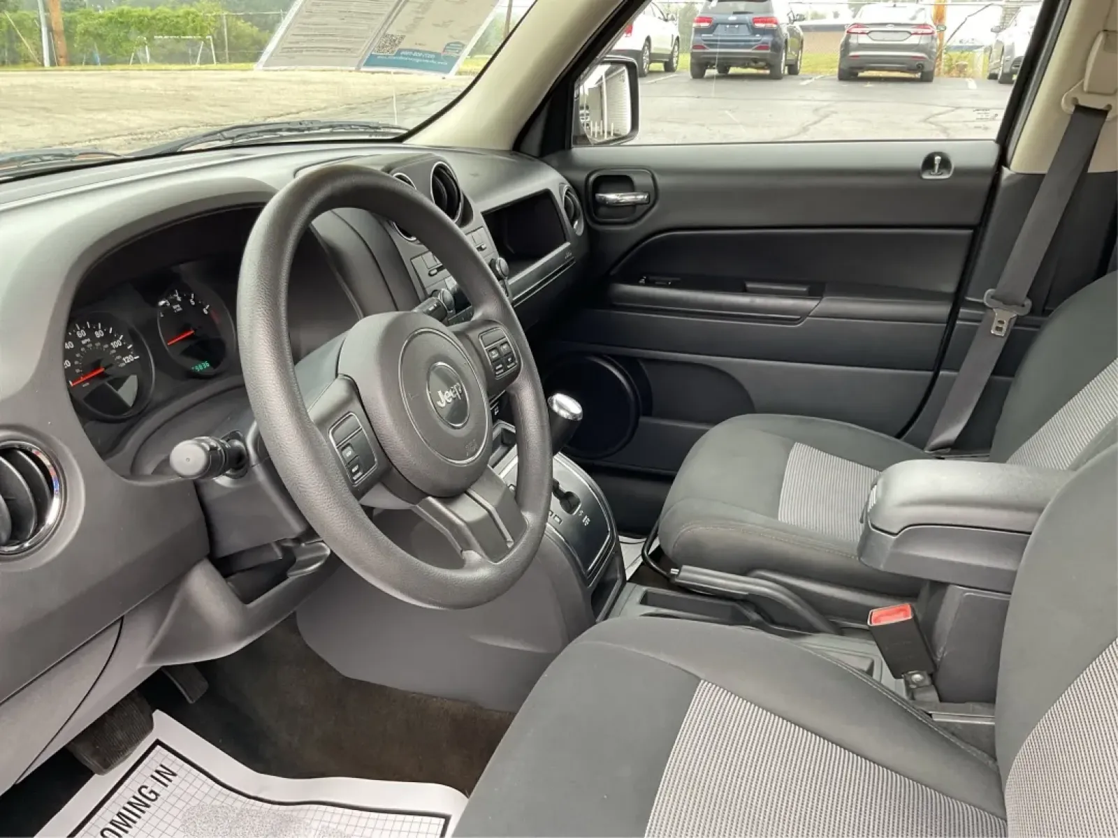 2013 Jeep Patriot Sport (1C4NJPBA8DD) with an Other engine, located at 1099 N County Rd 25A , Troy, OH, 45373, (937) 908-9800, 40.057079, -84.212883 - **Adventure Awaits: Discover the 2013 Jeep Patriot Sport at Advantage Car and Credit in Troy, OH!**<br /> <br /> Are you ready for your next adventure? Whether it's a weekend getaway with the family or a daily commuter ride through the beautiful streets of Troy, OH, the 2013 Jeep Patriot Sport offer - Photo#9