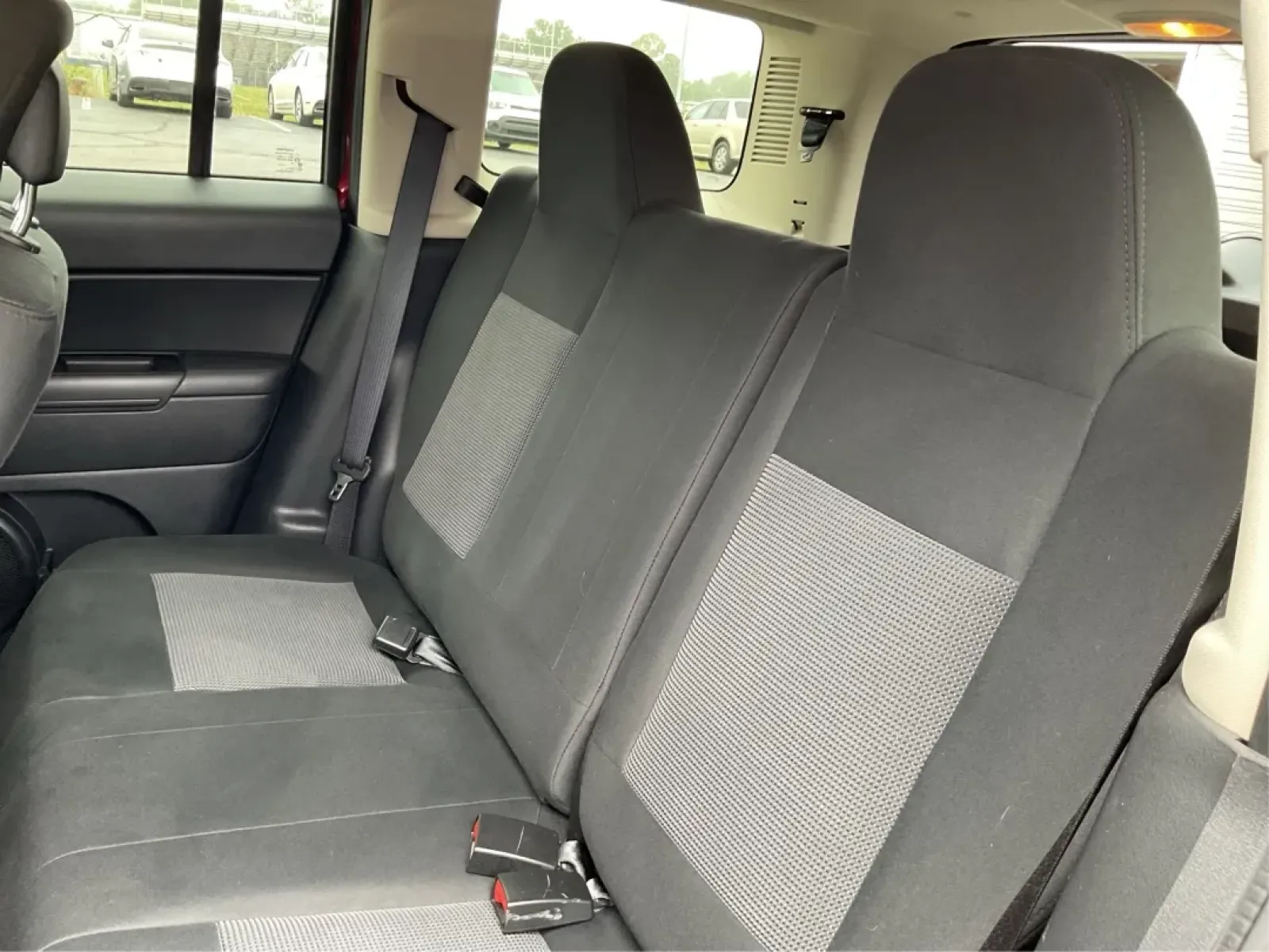 2013 Jeep Patriot Sport (1C4NJPBA8DD) with an Other engine, located at 1099 N County Rd 25A , Troy, OH, 45373, (937) 908-9800, 40.057079, -84.212883 - **Adventure Awaits: Discover the 2013 Jeep Patriot Sport at Advantage Car and Credit in Troy, OH!**<br /> <br /> Are you ready for your next adventure? Whether it's a weekend getaway with the family or a daily commuter ride through the beautiful streets of Troy, OH, the 2013 Jeep Patriot Sport offer - Photo#10