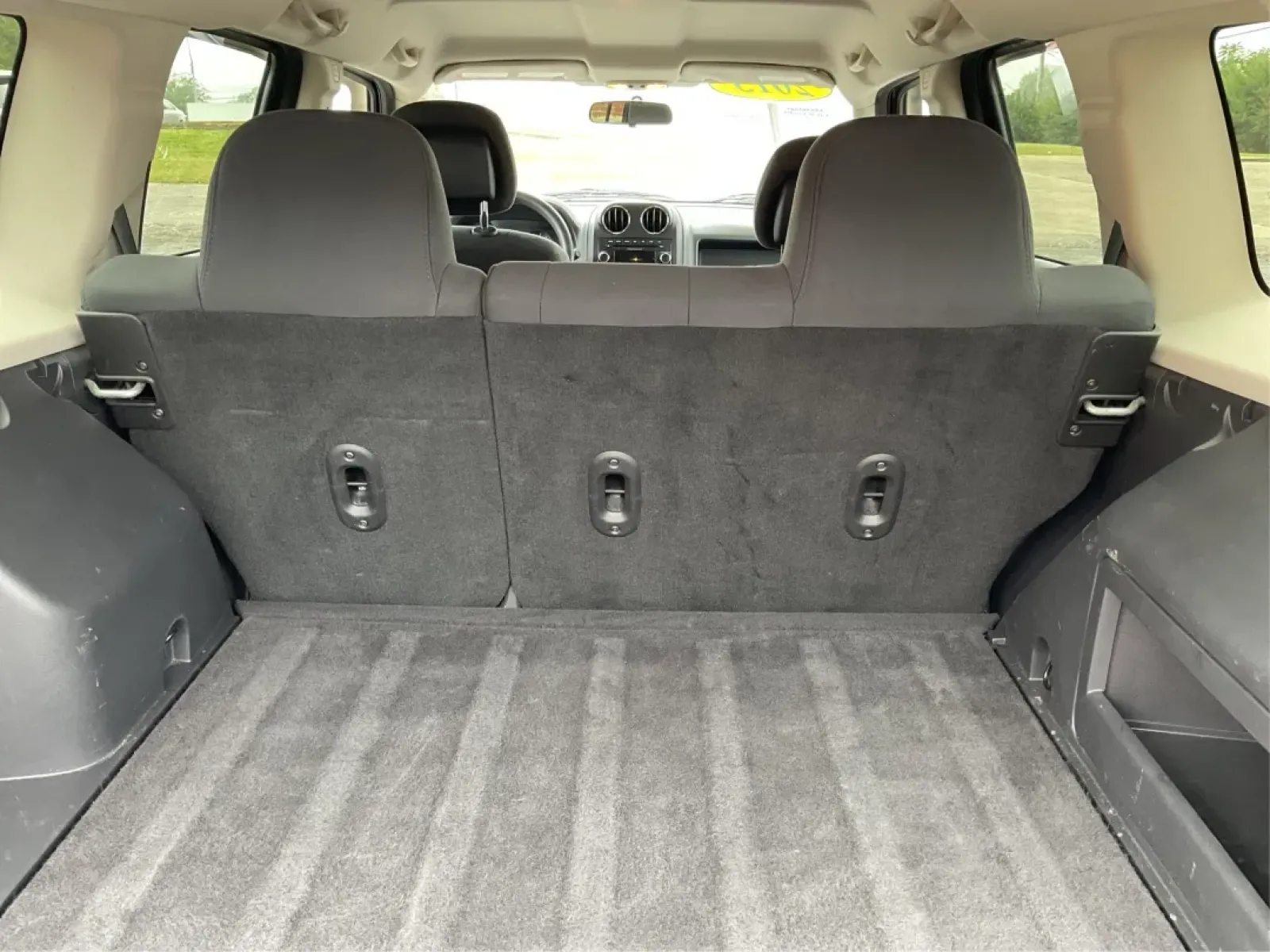 2013 Jeep Patriot Sport (1C4NJPBA8DD) with an Other engine, located at 1099 N County Rd 25A , Troy, OH, 45373, (937) 908-9800, 40.057079, -84.212883 - **Adventure Awaits: Discover the 2013 Jeep Patriot Sport at Advantage Car and Credit in Troy, OH!**<br /> <br /> Are you ready for your next adventure? Whether it's a weekend getaway with the family or a daily commuter ride through the beautiful streets of Troy, OH, the 2013 Jeep Patriot Sport offer - Photo#12