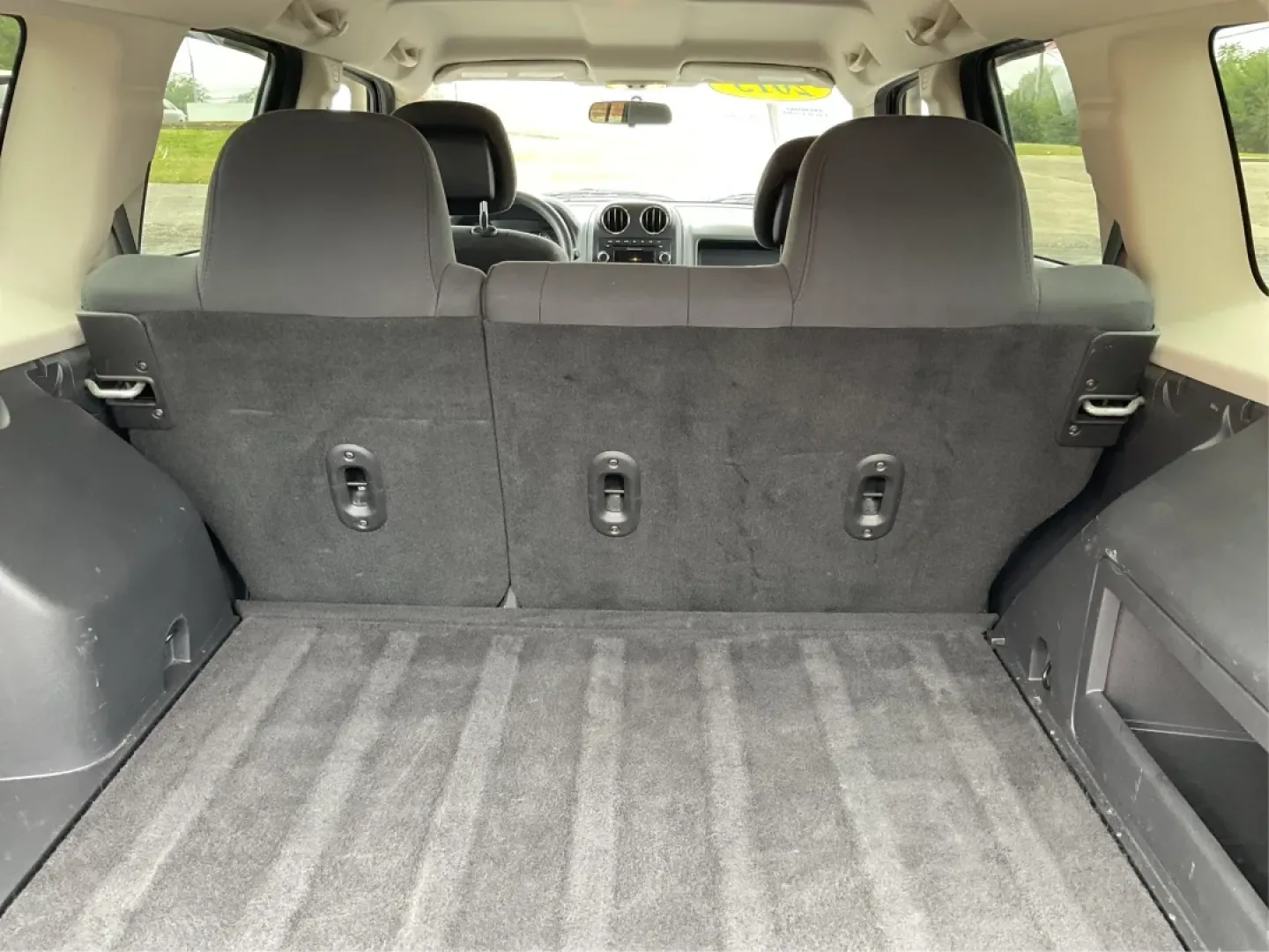 2013 Jeep Patriot Sport (1C4NJPBA8DD) with an Other engine, located at 880 E. National Road, Vandalia, OH, 45377, (937) 908-9800, 39.891918, -84.183594 - **Adventure Awaits: Discover the 2013 Jeep Patriot Sport at Advantage Car and Credit in Troy, OH!**<br /> <br /> Are you ready for your next adventure? Whether it's a weekend getaway with the family or a daily commuter ride through the beautiful streets of Troy, OH, the 2013 Jeep Patriot Sport offer - Photo#12