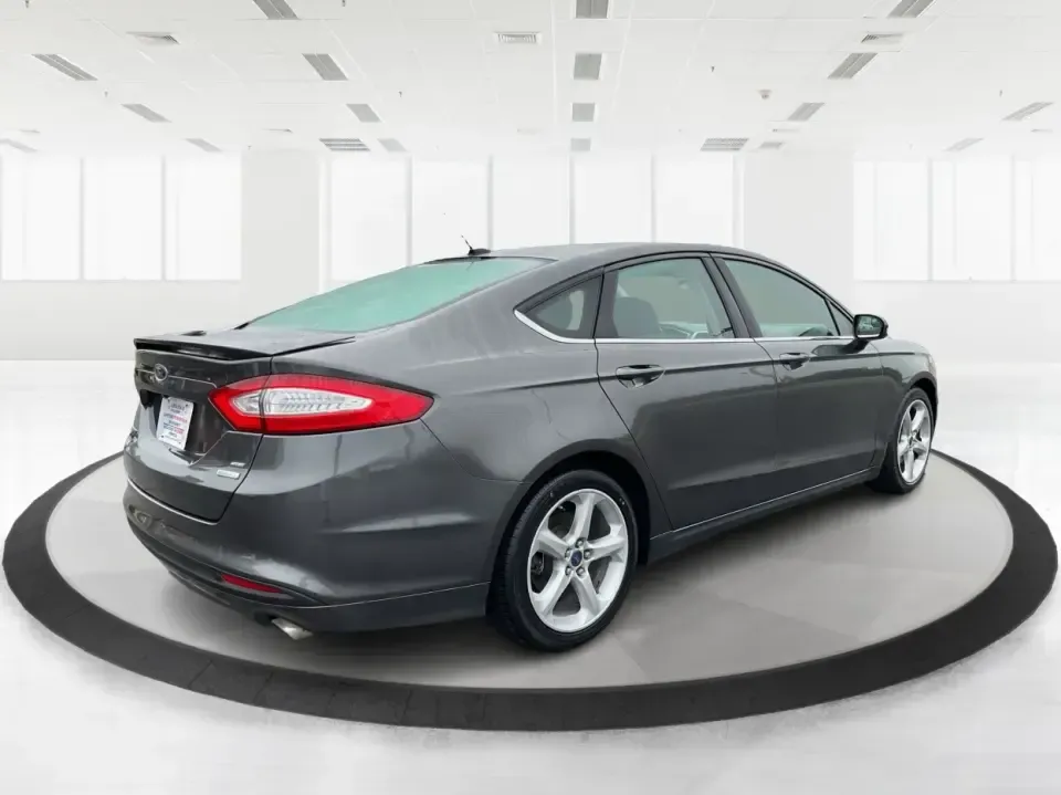 2016 Ford Fusion SE (3FA6P0HD1GR) with an 1.5L L4 DOHC 16V engine, 6-Speed Automatic transmission, located at 1099 N County Rd 25A , Troy, OH, 45373, (937) 908-9800, 40.057079, -84.212883 - **Experience Style and Comfort with the 2016 Ford Fusion SE at Advantage Car and Credit in Fairborn, OH!**<br /> <br /> Are you looking for a versatile sedan that fits seamlessly into your busy lifestyle? Whether you're a commuter tackling daily traffic, a growing family seeking comfort on the road, - Photo#2