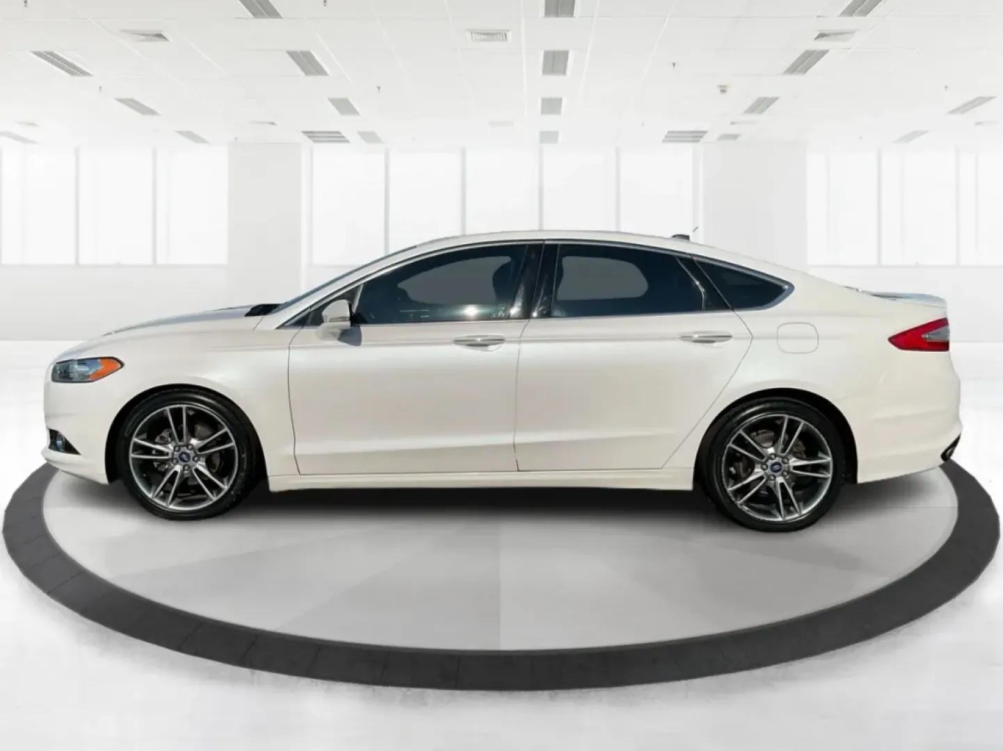 2014 Ford Fusion Titanium (3FA6P0D93ER) with an EcoBoost 2L I-4 gasoline direct injection engine, located at 4508 South Dixie Dr, Moraine, OH, 45439, (937) 908-9800, 39.689976, -84.218452 - Are you ready to elevate your daily commute or make unforgettable memories on family road trips? Introducing the stunning 2014 Ford Fusion Titanium, now available at Advantage Car and Credit in Moraine, OH. This sleek sedan seamlessly blends style, comfort, and performance, making it an ideal choice - Photo#5