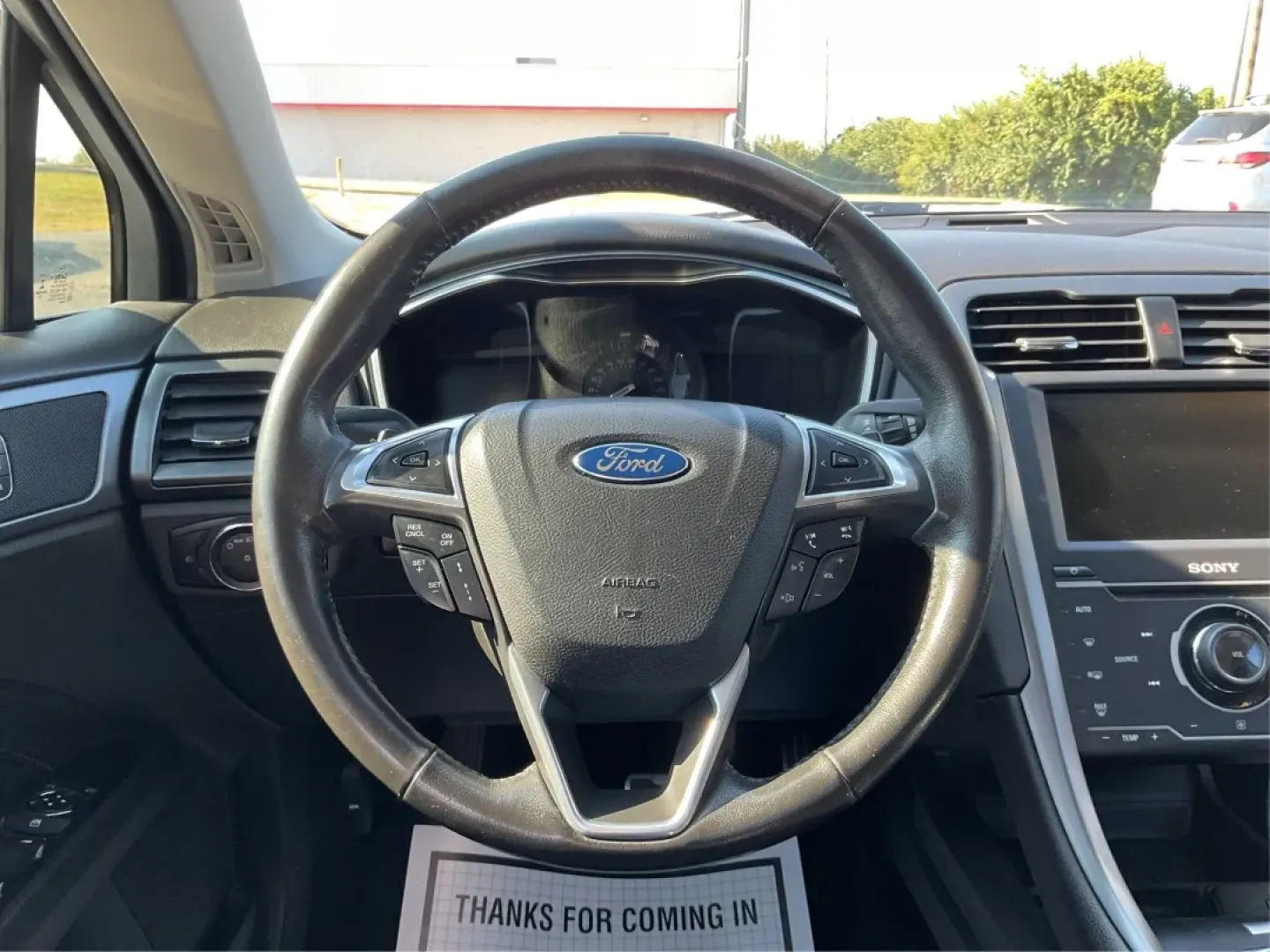 2014 Ford Fusion Titanium (3FA6P0D93ER) with an EcoBoost 2L I-4 gasoline direct injection engine, located at 4508 South Dixie Dr, Moraine, OH, 45439, (937) 908-9800, 39.689976, -84.218452 - Are you ready to elevate your daily commute or make unforgettable memories on family road trips? Introducing the stunning 2014 Ford Fusion Titanium, now available at Advantage Car and Credit in Moraine, OH. This sleek sedan seamlessly blends style, comfort, and performance, making it an ideal choice - Photo#16