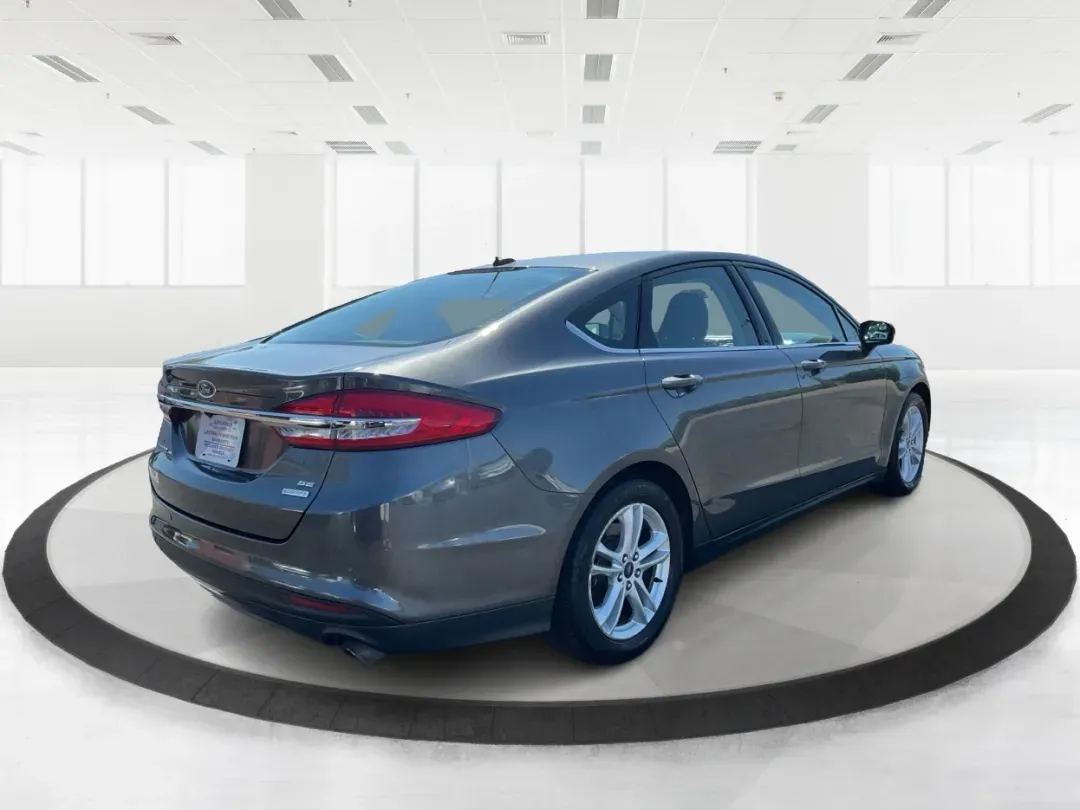 2018 Ford Fusion SE (3FA6P0HD3JR) with an 1.5L L4 DOHC 16V engine, 6A transmission, located at 1099 N County Rd 25A , Troy, OH, 45373, (937) 908-9800, 40.057079, -84.212883 - Looking for a reliable sedan that combines style, comfort, and practicality? Look no further than the 2018 Ford Fusion SE, available now at Advantage Car and Credit in Vandalia, OH! Perfect for your daily commute, family outings, or even weekend adventures, this vehicle is designed to enhance your l - Photo#2