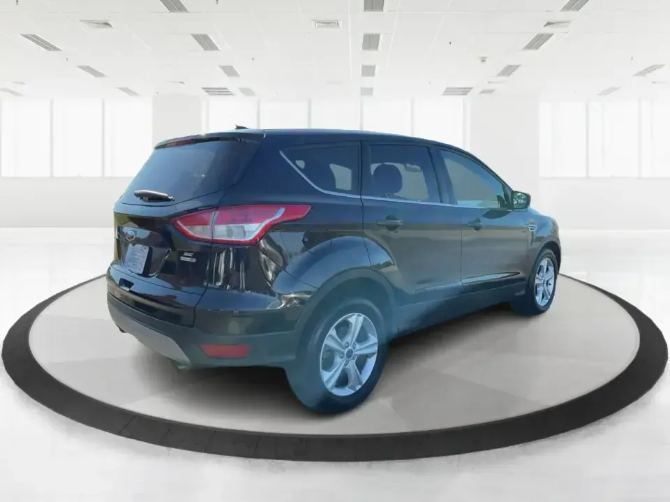 2016 Ford Escape SE (1FMCU9G92GU) with an 2.0L L4 DOHC 16V engine, 6-Speed Automatic transmission, located at 1951 S Dayton Lakeview Rd., New Carlisle, OH, 45344, (937) 908-9800, 39.890999, -84.050255 - **Adventure Awaits with the 2016 Ford Escape SE at Advantage Car and Credit - New Carlisle!**<br /> <br /> Are you ready to elevate your lifestyle with a vehicle that can handle both your daily commutes and weekend getaways? Look no further than this stunning 2016 Ford Escape SE, available now at Ad - Photo#2