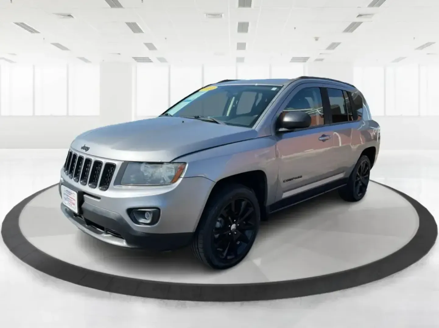 2015 Jeep Compass Altitude Edition (1C4NJCBA6FD) with an 2L I-4 DOHC engine, Continuously Variable Transmission (CVT) transmission, located at 8750 N County Rd 25A, Piqua, OH, 45356, (937) 908-9800, 40.164391, -84.232513 - **Adventure Awaits in the 2015 Jeep Compass Altitude Edition at Advantage Car and Credit - Fairborn!**<br /> <br /> Are you ready for your next adventure? The 2015 Jeep Compass Altitude Edition is your perfect companion for weekend getaways, family road trips, or even your daily commute! This versat - Photo#8